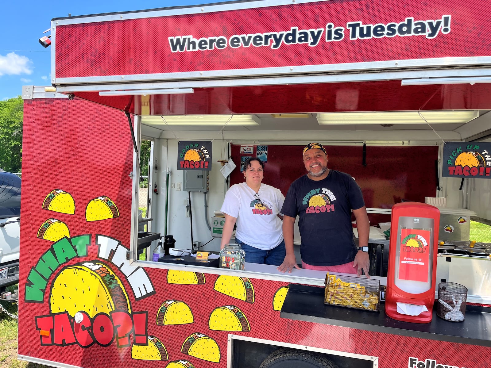 Pictured is Cory Thompson, president of the Dayton Food Truck Association and owner of What The Taco?!, with employee Mackenzie Nangle. NATALIE JONES/STAFF