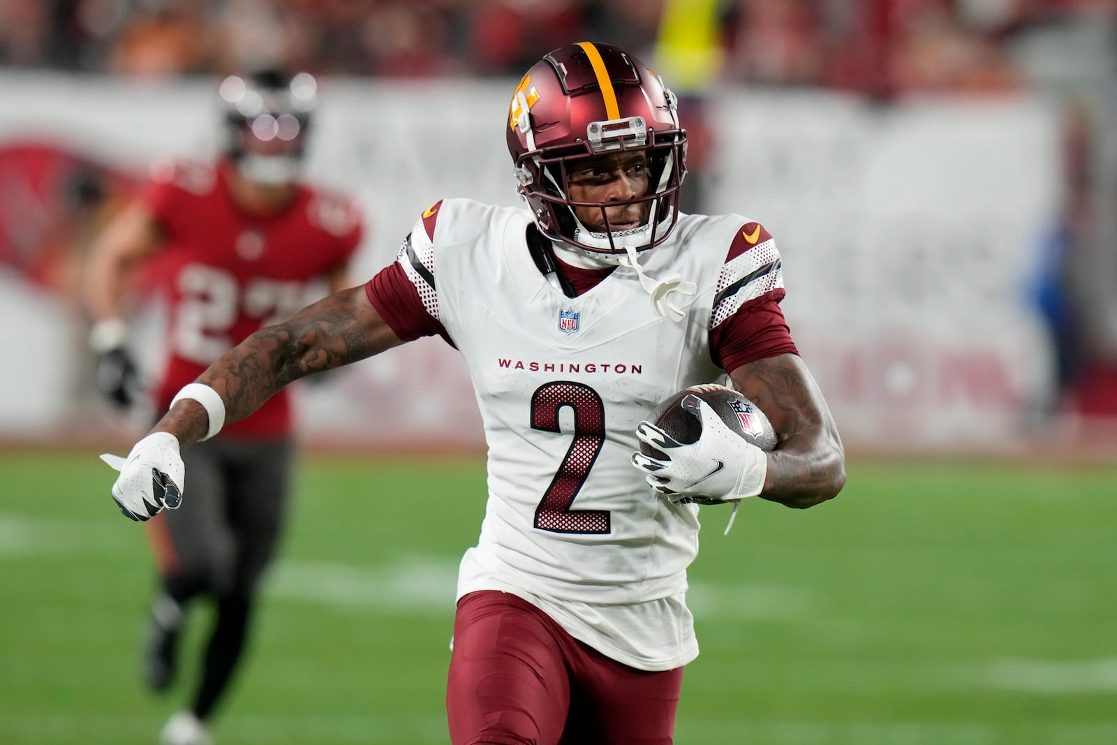 Washington Commanders wide receiver Dyami Brown (2) runs against the Tampa Bay Buccaneers during the second half of an NFL wild-card playoff football game in Tampa, Fla., Sunday, Jan. 12, 2025. (AP Photo/Chris O'Meara)