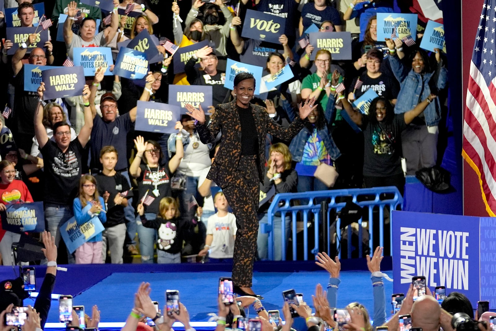 Former first lady Michelle Obama arrives to speak at a campaign rally for democratic presidential nominee Vice President Kamala Harris at the Wings Event Center, in Kalamazoo, Mich., Saturday, Oct. 26, 2024. (AP Photo/Paul Sancya)