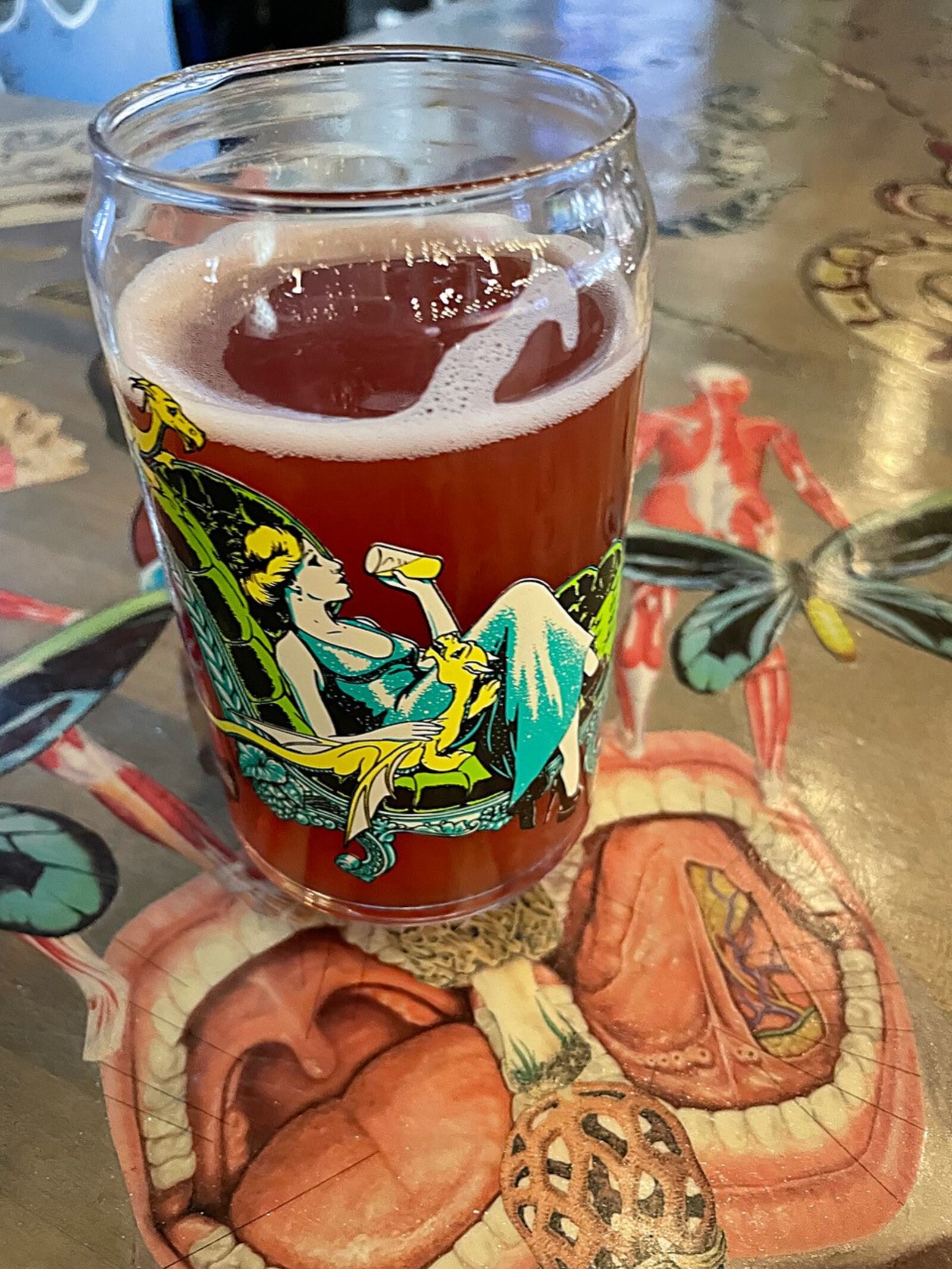 The Ohio Craft Brewers Association is celebrating its fourth annual Ohio Pint Day on Tuesday, Sept. 26 with a collectible glass designed by Amy Kollar Anderson, co-owner of Nowhere in Particular Cabinet of Curiosities in Kettering. CONTRIBUTED PHOTO