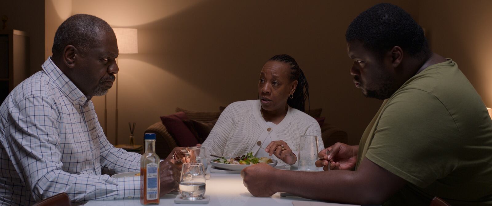 This image released by Bleecker Street shows David Webber, from left, Marianne Jean-Baptiste, and Tuwaine Barrett in a scene from "Hard Truths." (Simon Mein/Bleecker Street via AP)