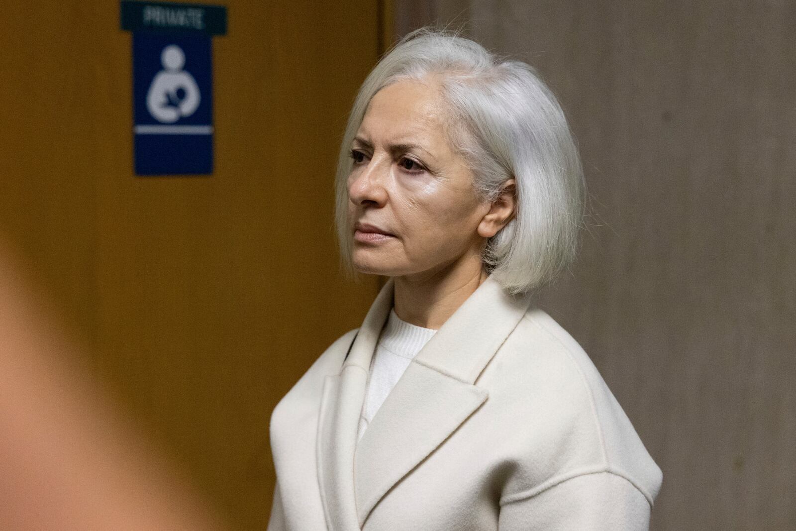 Mahnaz Tayarani, the mother of Nima Momeni, arrives at the Hall of Justice during the murder trial of Nima Momeni, Tuesday, Dec. 17, 2024, in San Francisco. (AP Photo/Benjamin Fanjoy)