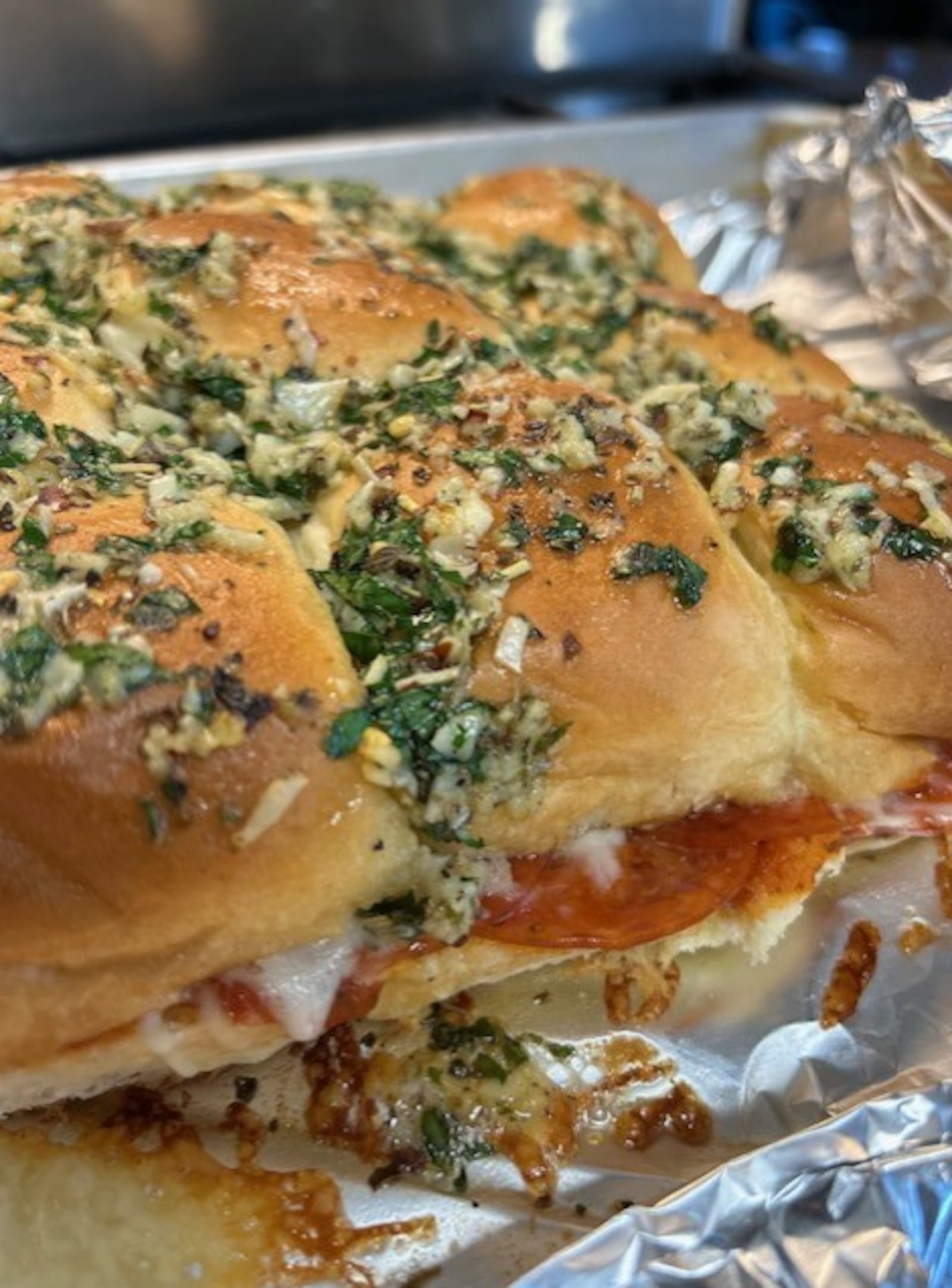 Pepperoni pizza sliders come together easily and take about 15-20 minutes to bake. JANA COLLIER/CONTRIBUTED