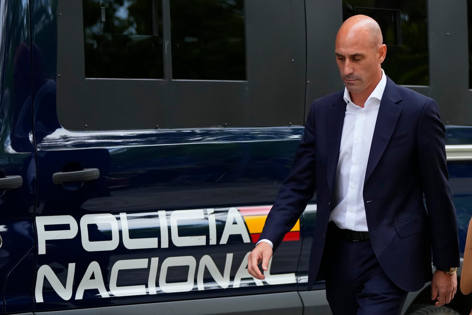 FILE - The former president of Spain's soccer federation Luis Rubiales passes a police van as he leaves after testifying at the National Court in Madrid, Spain, Friday, Sept. 15, 2023. (AP Photo/Manu Fernandez, File)