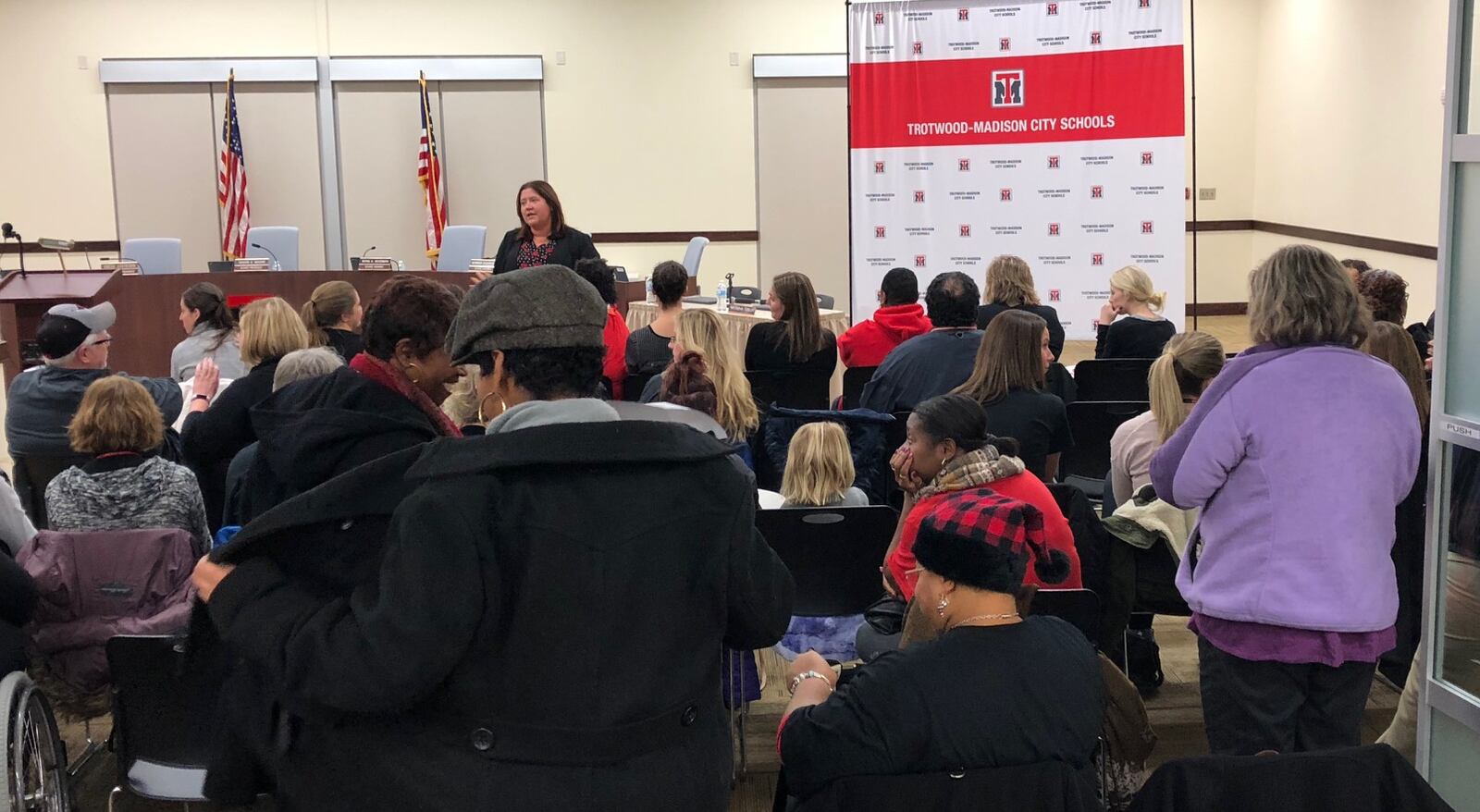 Dozens of teachers wait for a Trotwood school board meeting to begin on Dec. 6, 2018. The teachers union expressed "deep concern" about a multiyear contract for superintendent Tyrone Olverson, but the school board approved the deal.