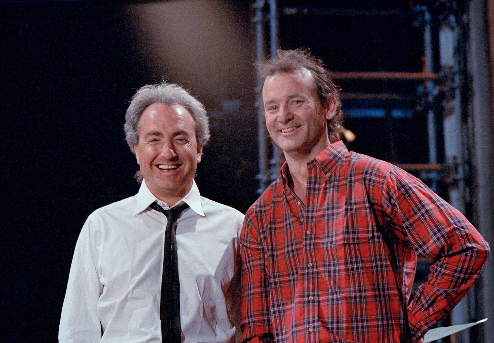 FILE - "Saturday Night Live" host Bill Murray, a former cast member, is pictured with producer Lorne Michaels, left, during rehearsals on March 19, 1987, in New York. (AP Photo/G. Paul Burnett, File)