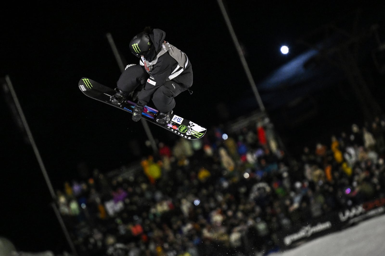 Gaon Choi of South Korea in action during a snowboard halfpipe competition at Laax Open, Saturday, Jan. 18, 2025, in Laax, Switzerland. (Gian Ehrenzeller/Keystone via AP)