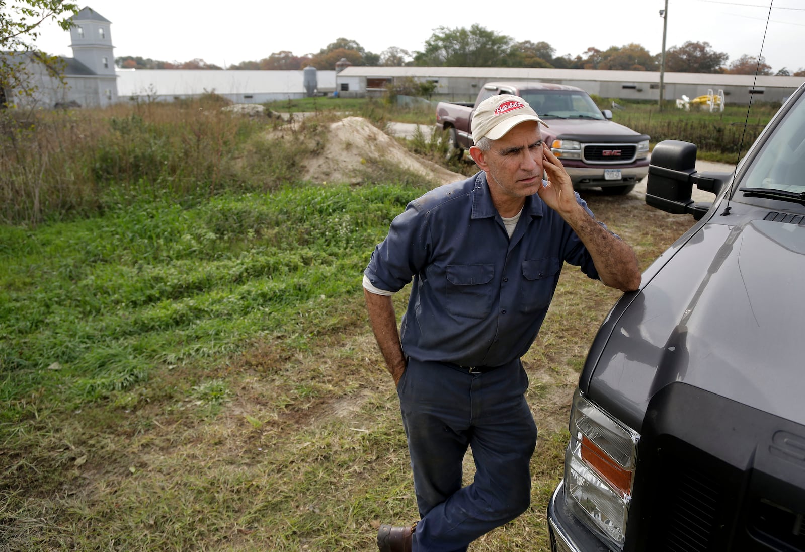 FILE - Doug Corwin talks about the history and development of his duck farm, Crescent Duck Farm, in Aquebogue, N.Y., Oct. 29, 2014. (AP Photo/Julie Jacobson, File)