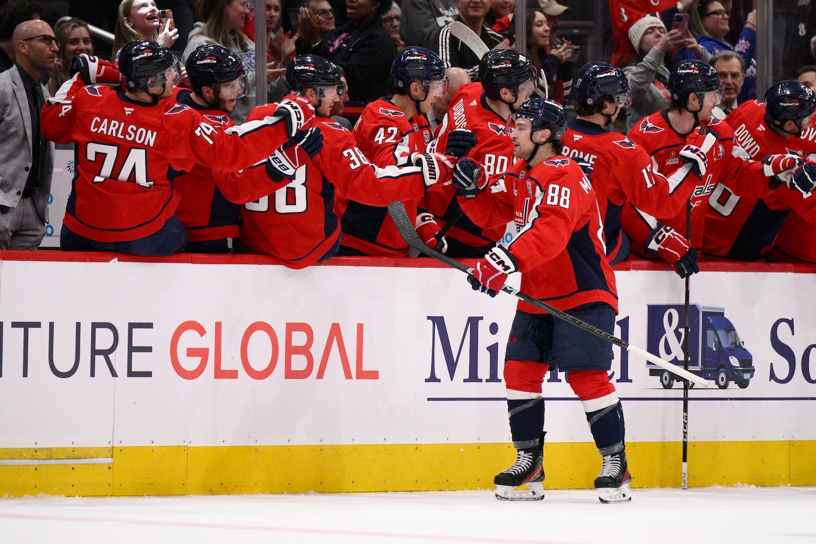 Washington Capitals left wing Andrew Mangiapane (88) celebrates after his goal during the second period of an NHL hockey game against the Philadelphia Flyers, Thursday, March 20, 2025, in Washington. (AP Photo/Nick Wass)