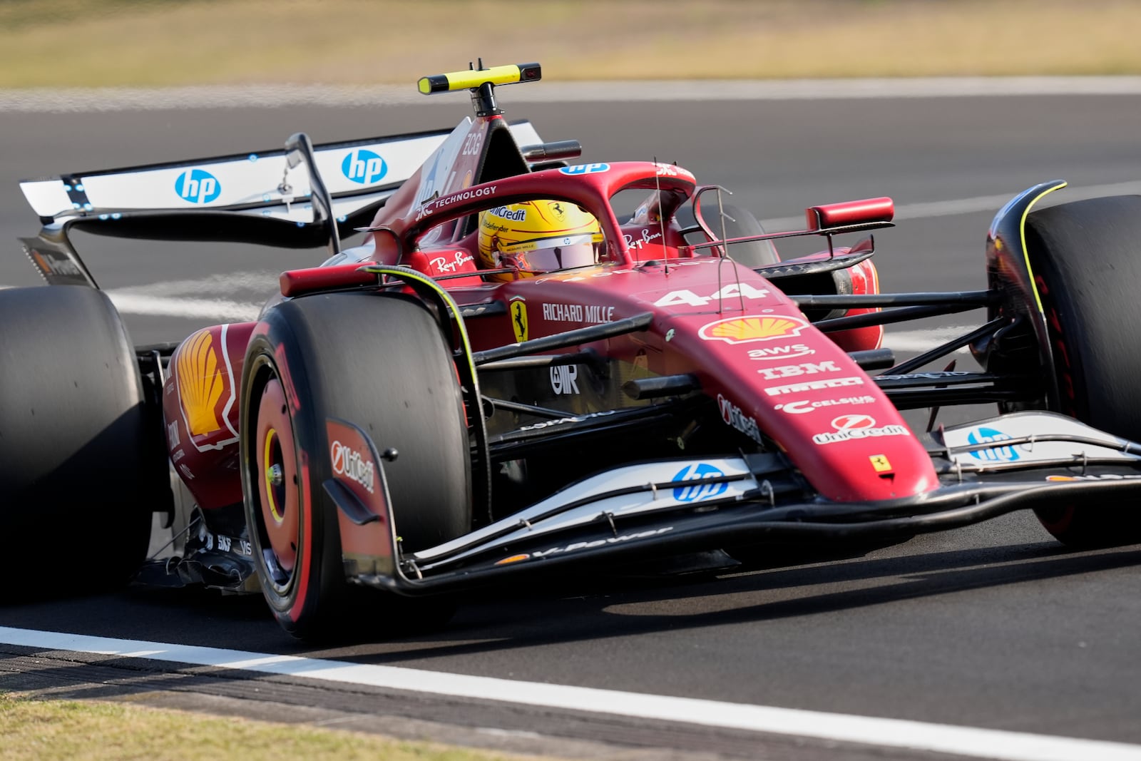 Ferrari driver Lewis Hamilton of Britain steers his car during qualifying session for the Chinese Formula One Grand Prix at the Shanghai International Circuit, Shanghai, Saturday, March 22, 2025. (AP Photo)