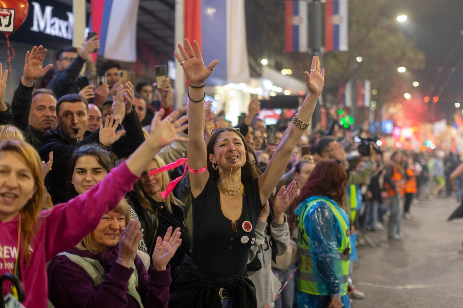 People cheer and greet university students as they arrive at a protest ahead of a major anti-corruption rally this weekend, in Belgrade, Serbia, Friday, March 14, 2025. (AP Photo/Marko Drobnjakovic)