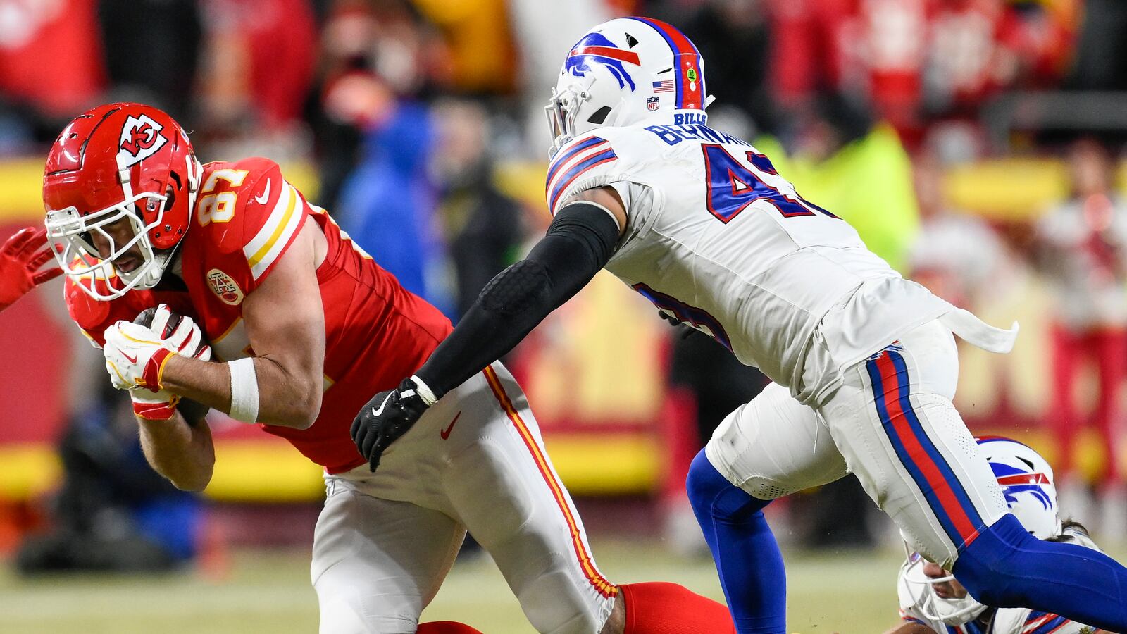 Buffalo Bills linebacker Terrel Bernard (43) pursues Kansas City Chiefs tight end Travis Kelce (87) during the second half of the AFC Championship NFL football game, Sunday, Jan. 26, 2025, in Kansas City, Mo. (AP Photo/Reed Hoffmann)