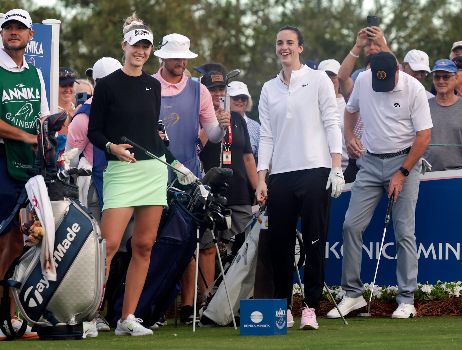 LPGA pro golfer Nelly Korda, left, chats with WNBA basketball Caitlin Clark, of the Indiana Fever, at the third tee during the pro-am at the LPGA Tour golf tournament, Wednesday, Nov 13, 2024, at the Pelican Golf Club in Belleair, Fla. (Douglas R. Clifford/Tampa Bay Times via AP)