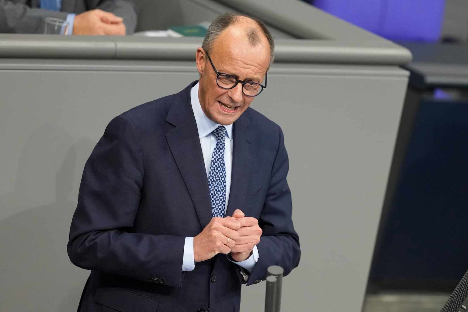 German opposition leader and Christian Union parties floor leader Friedrich Merz speaks at a debate about migration at the German parliament Bundestag in Berlin, Germany, Wednesday, Jan. 29, 2025. (AP Photo/Markus Schreiber)