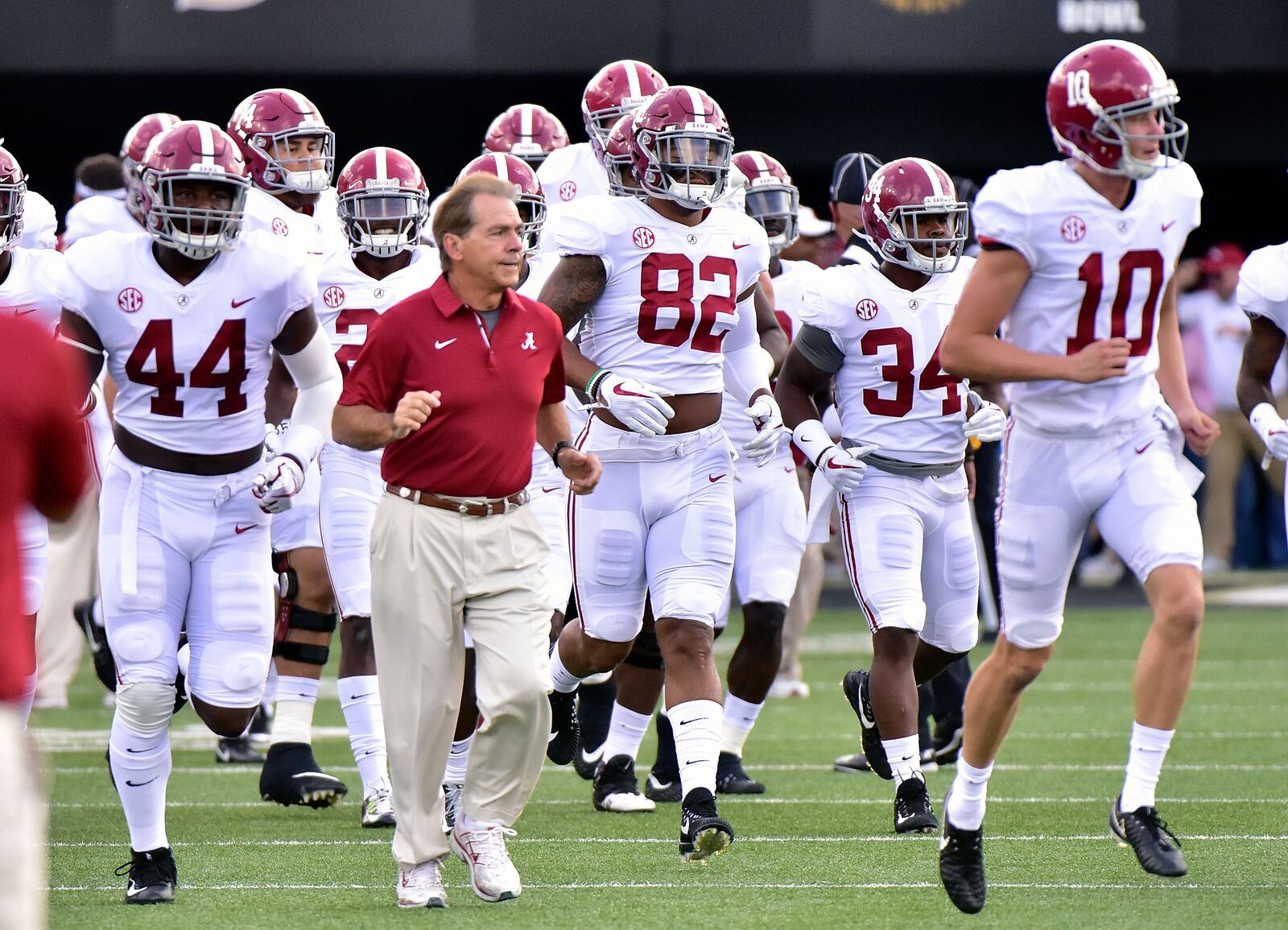 NASHVILLE, TN - SEPTEMBER 23: Head coach Nick Saban of the Alabama Crimson Tide runs onto the field with his team prior to a game against the Vanderbilt Commodores during the first half at Vanderbilt Stadium on September 23, 2017 in Nashville, Tennessee. (Photo by Frederick Breedon/Getty Images)