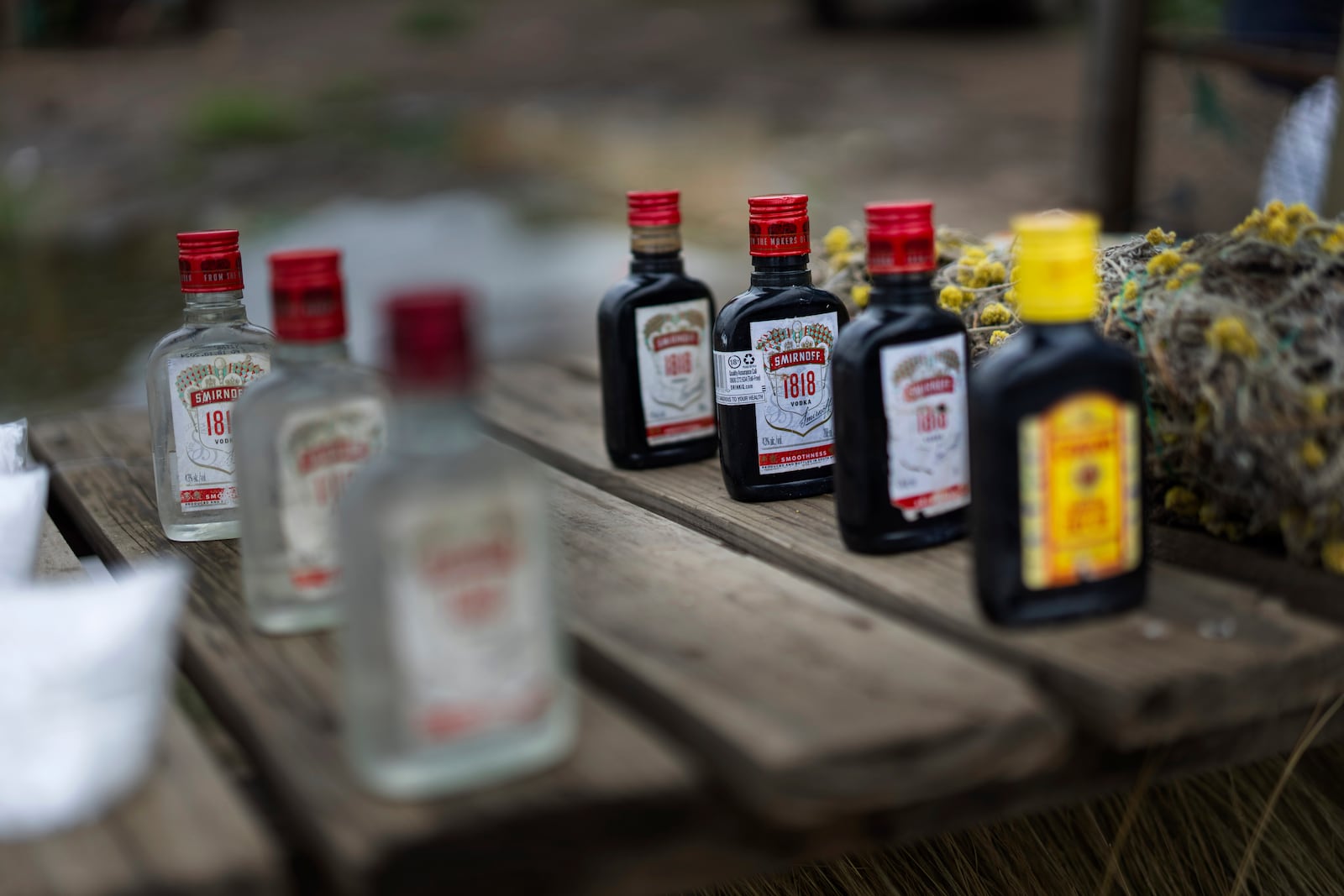 Alcool is sold at the market in Umzimkhulu municipality, Tuesday, Nov. 11, 2025, one of the most affected place in South Africa by U.S. President Donald Trump's global foreign aid freeze, raising worries about HIV patients defaulting on treatment. (AP Photo/Jerome Delay)