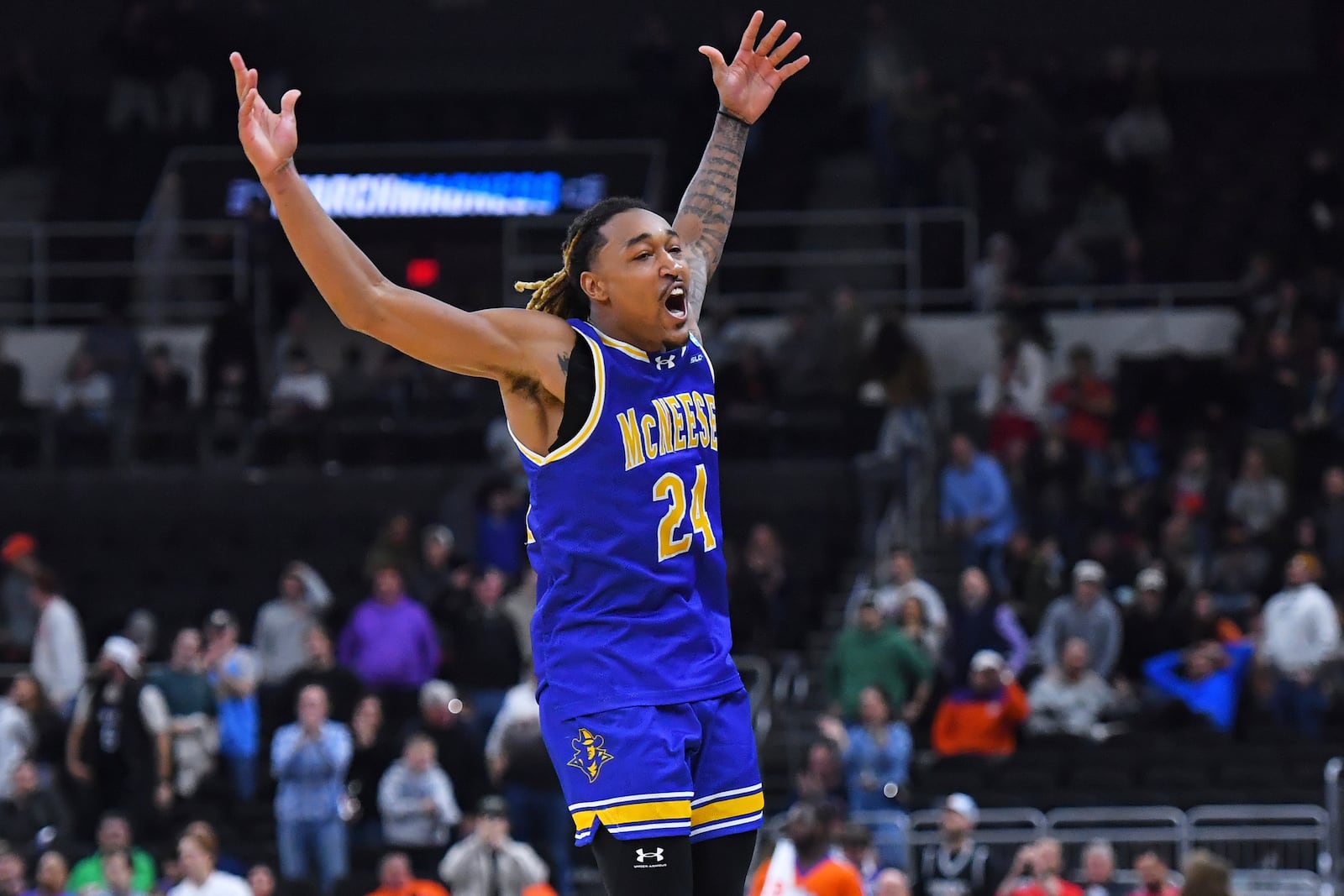 McNeese State forward Christian Shumate (24) celebrates during the second half in the first round of the NCAA college basketball tournament, Thursday, March 20, 2025, in Providence, R.I. (AP Photo/Steven Senne)