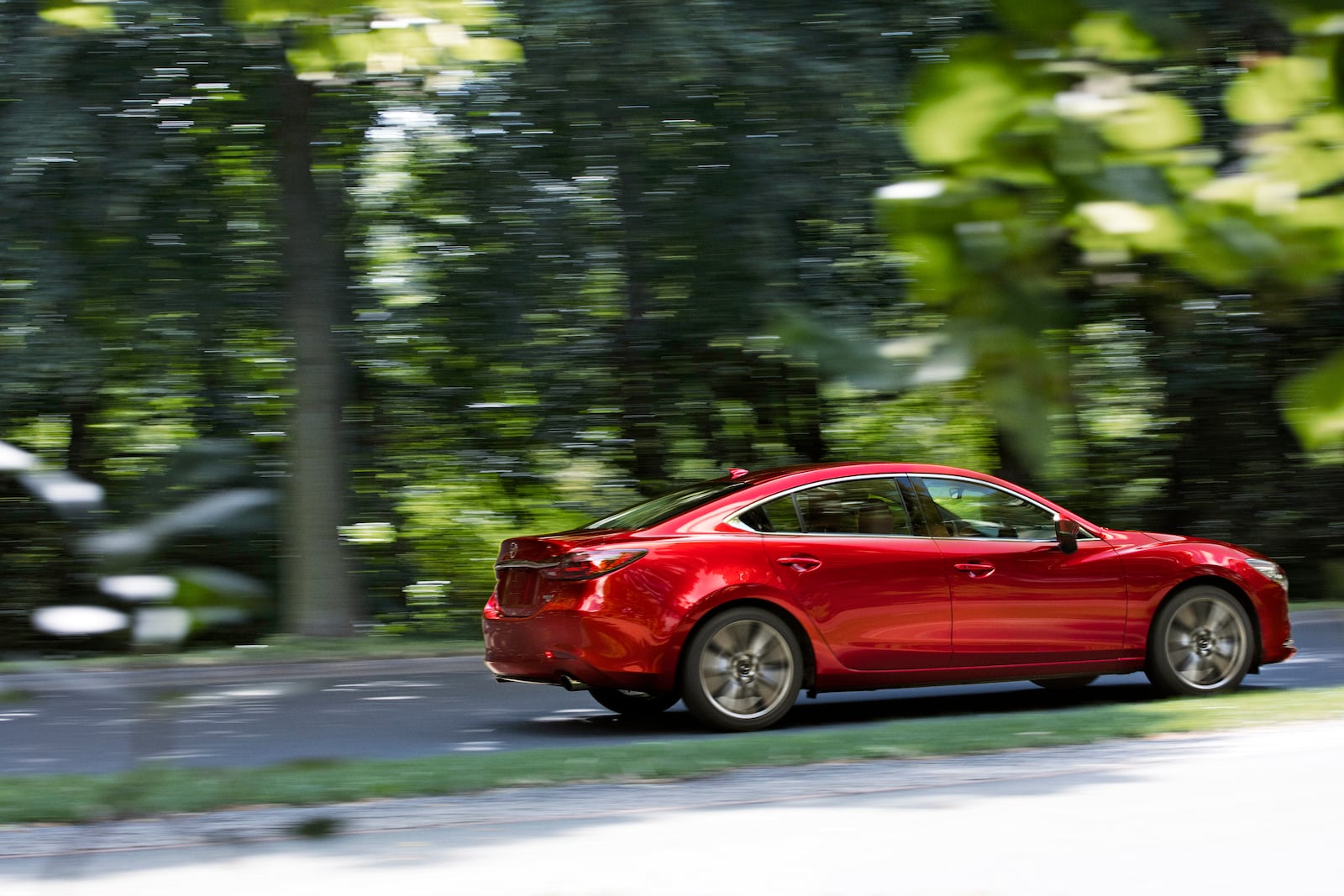 This photo provided by Mazda shows the 2021 Mazda 6, a midsize sedan with a sporty driving style and excellent interior for its price. (Mazda North American Operations via AP)