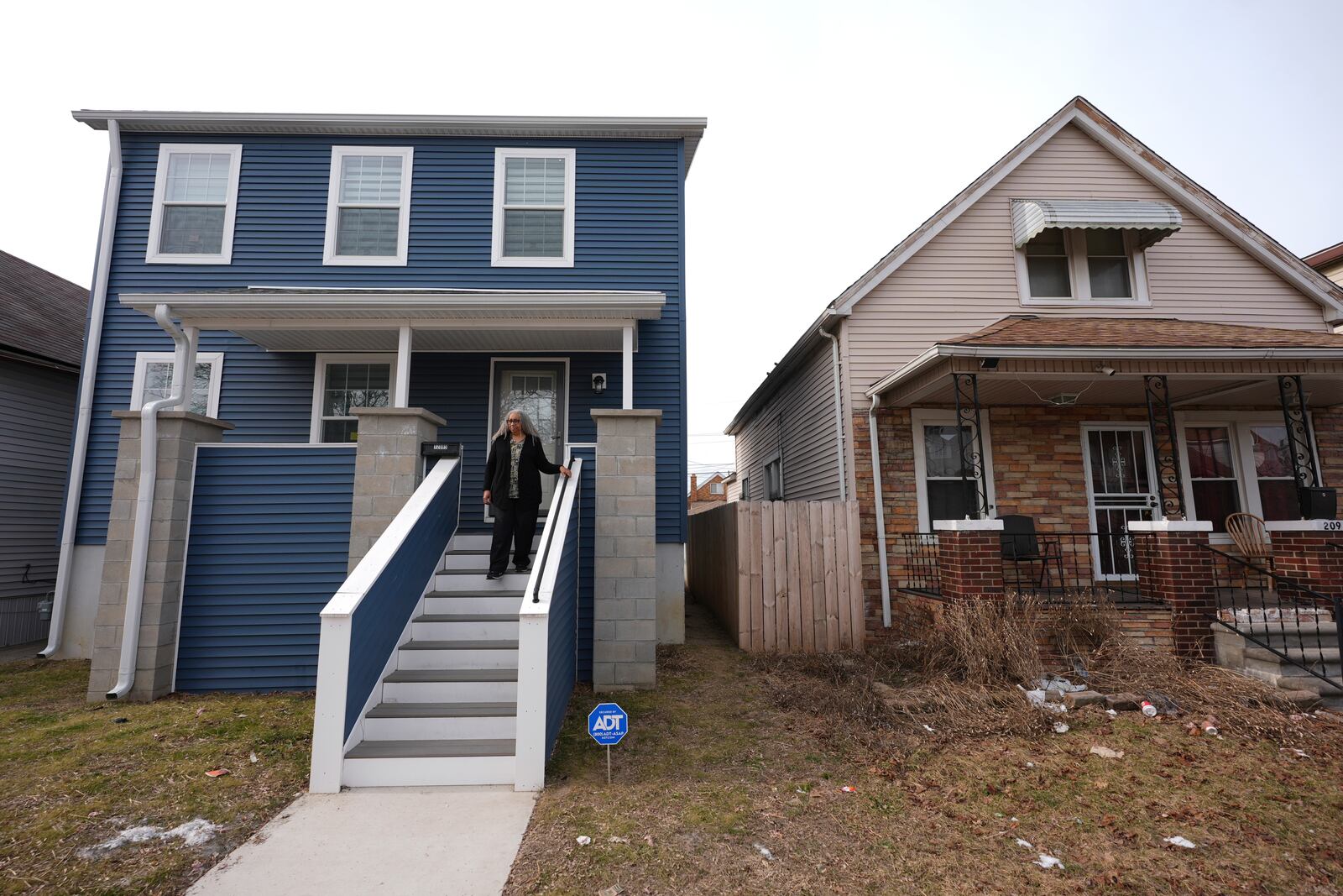 Leslie Knox walks outside her home Wednesday, Feb. 5, 2025, in Hamtramck, Mich. (AP Photo/Paul Sancya)