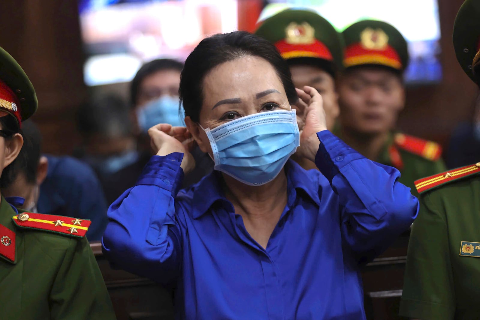 Vietnamese real estate tycoon Truong My Lan sits in court to wait for her verdict on fraud, money laundering and illegal cross-border money transferring in Ho Chi Minh city, Vietnam Thursday, Oct. 17, 2024. (Quynh Tran/VnExpress via AP)