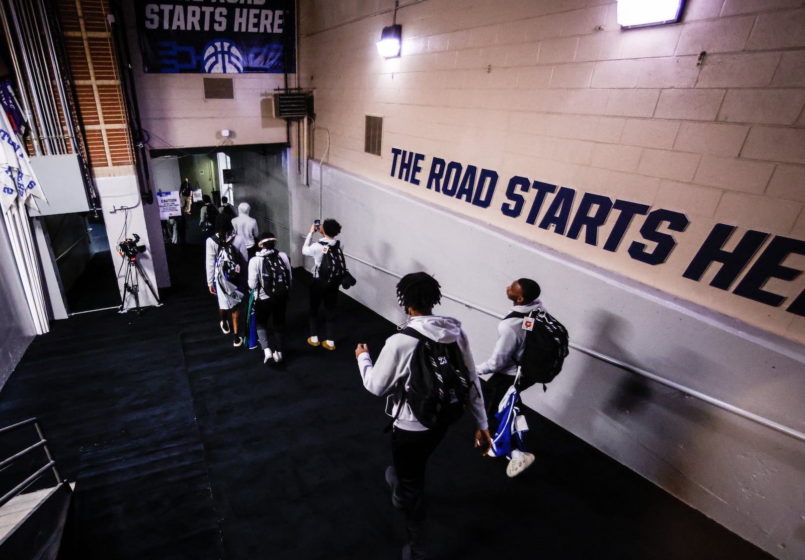 Teams file into UD Arena for First Four basketball games in 2022. Jim Noelker/STAFF