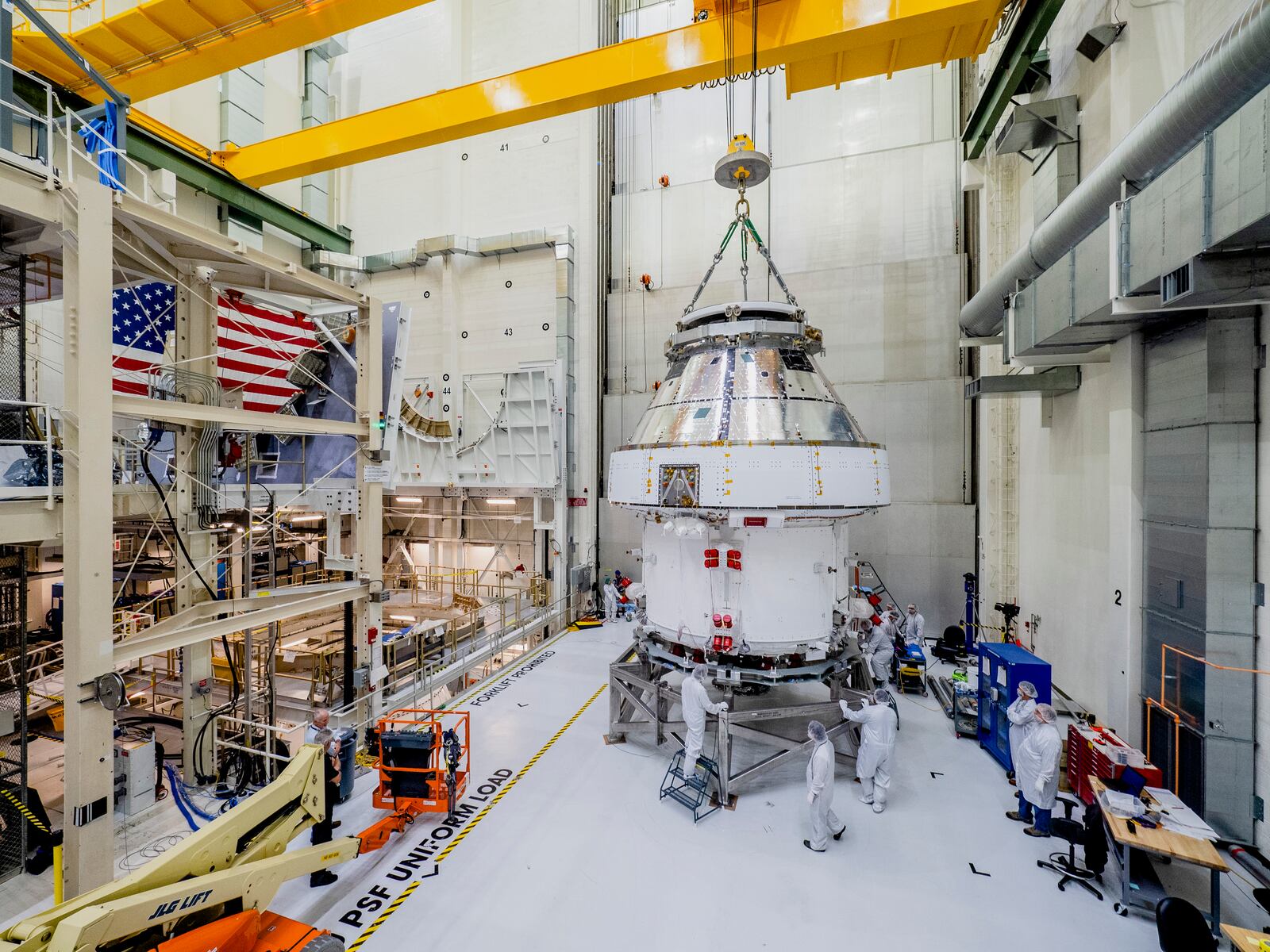 NASA's Orion spacecraft moved from assembly stand ahead of shipment to Sandusky, Ohio for tests in this 2019 NASA photo.