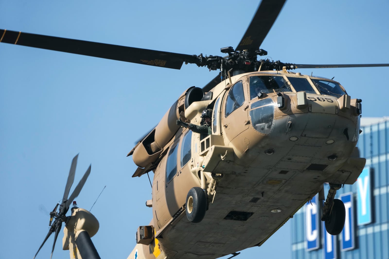 An Israeli military helicopter carrying Israeli soldier Agam Berger released from Gaza arrives to the Beilinson hospital in Petah Tikva, near Tel Aviv, Israel, Thursday, Jan. 30, 2025. (AP Photo/Oded Balilty)