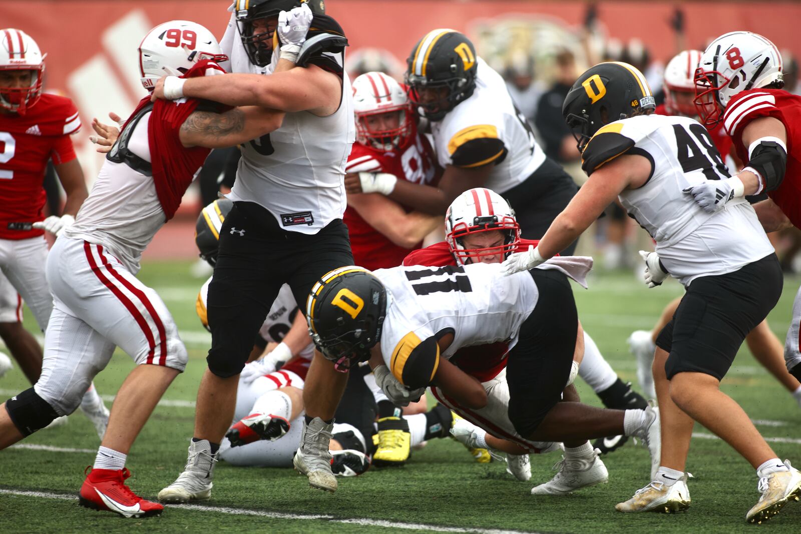 DePauw's Caden Whitehead's runs for the game game-winning touchdown in overtime against Wittenberg on Saturday, Oct. 21, 2023, at Edwards-Maurer Field in Springfield. David Jablonski/Staff