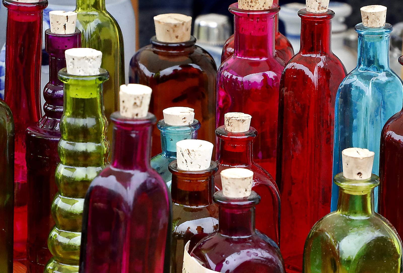 A group of unique bottles on sale at last year’s Fair at New Boston. This year’s fair is Saturday and Sunday, Sept.1-2, at George Rogers Clark Park. BILL LACKEY/STAFF