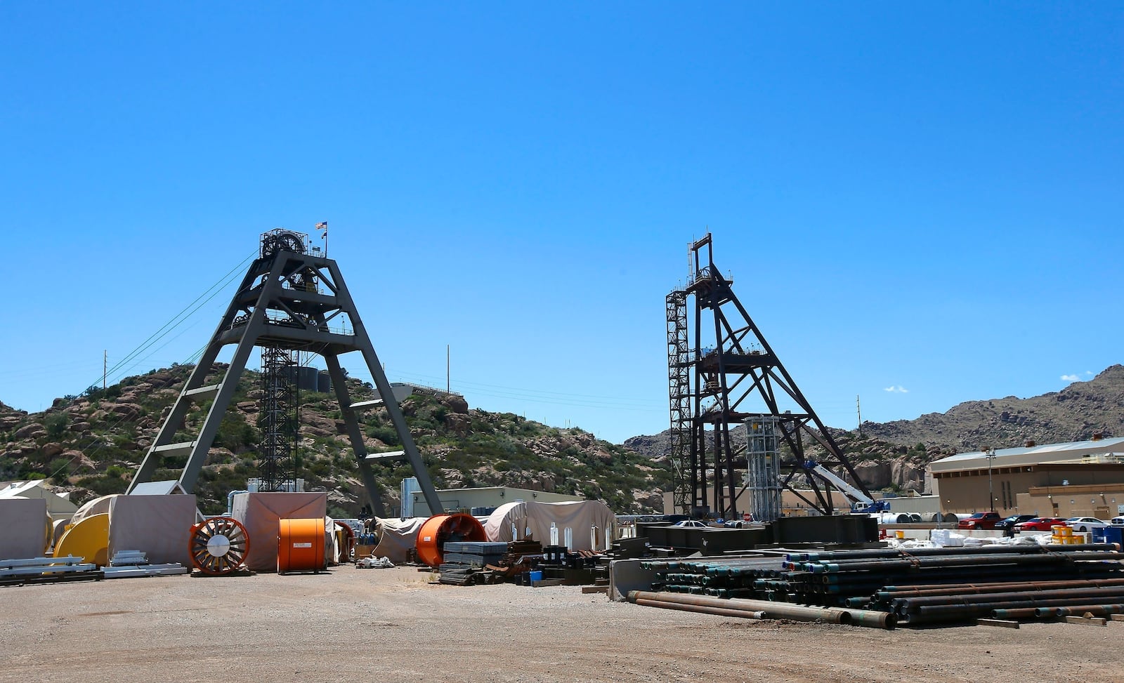 FILE - This file photo taken June 15, 2015, shows the Resolution Copper Mining area Shaft #9, right, and Shaft #10, left, that awaits the expansion go ahead in Superior, Ariz. (AP Photo/Ross D. Franklin, File)