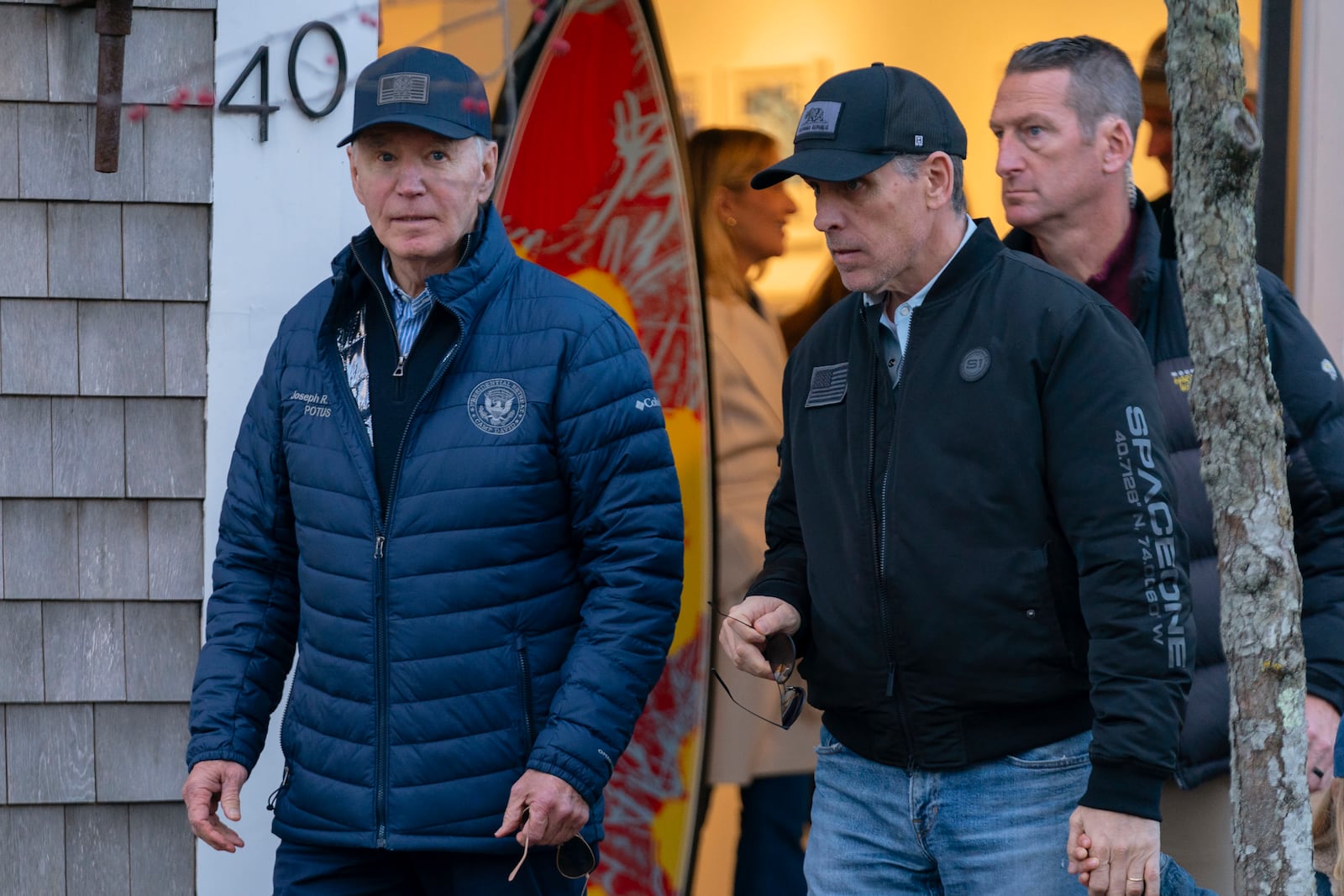 President Joe Biden and son Hunter Biden walk in downtown Nantucket Mass., Friday, Nov. 29, 2024. (AP Photo/Jose Luis Magana)