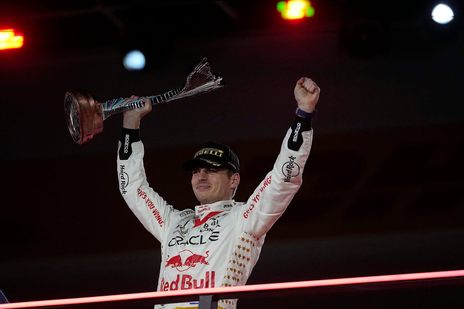 FILE - Red Bull driver Max Verstappen, of the Netherlands, celebrates on the podium after winning the Formula One Las Vegas Grand Prix auto race, Saturday, Nov. 18, 2023, in Las Vegas. (AP Photo/Darron Cummings, File)