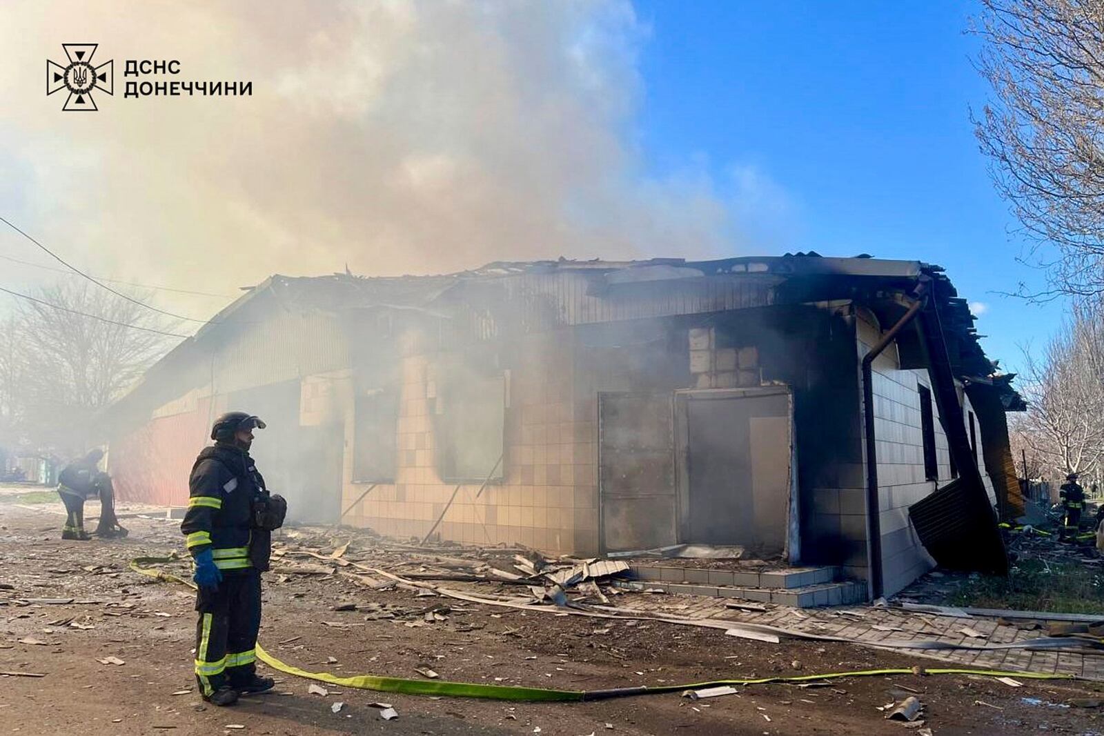 In this photo provided by the Ukrainian Emergency Service, firefighters put out the fire at a storehouse following a Russian attack in Kostiantynivka, Donetsk region, Ukraine, Thursday, March 20, 2025. (Ukrainian Emergency Service via AP)