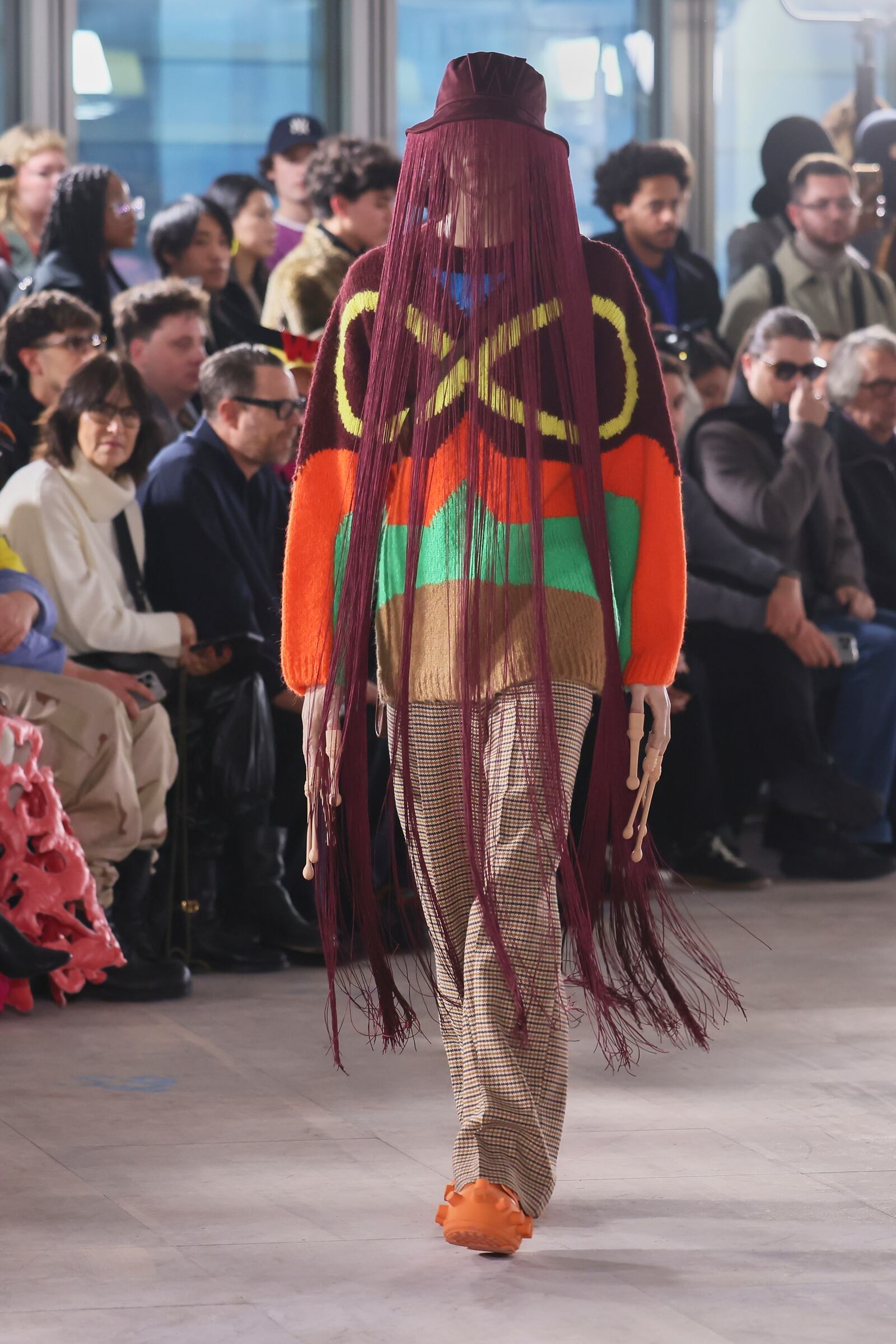 A model wears a creation as part of the men's Walter van Beirendonck Fall-Winter 2025-2026 collection, that was presented in Paris, Wednesday, Jan. 22, 2025. (AP Photo/Thomas Padilla).