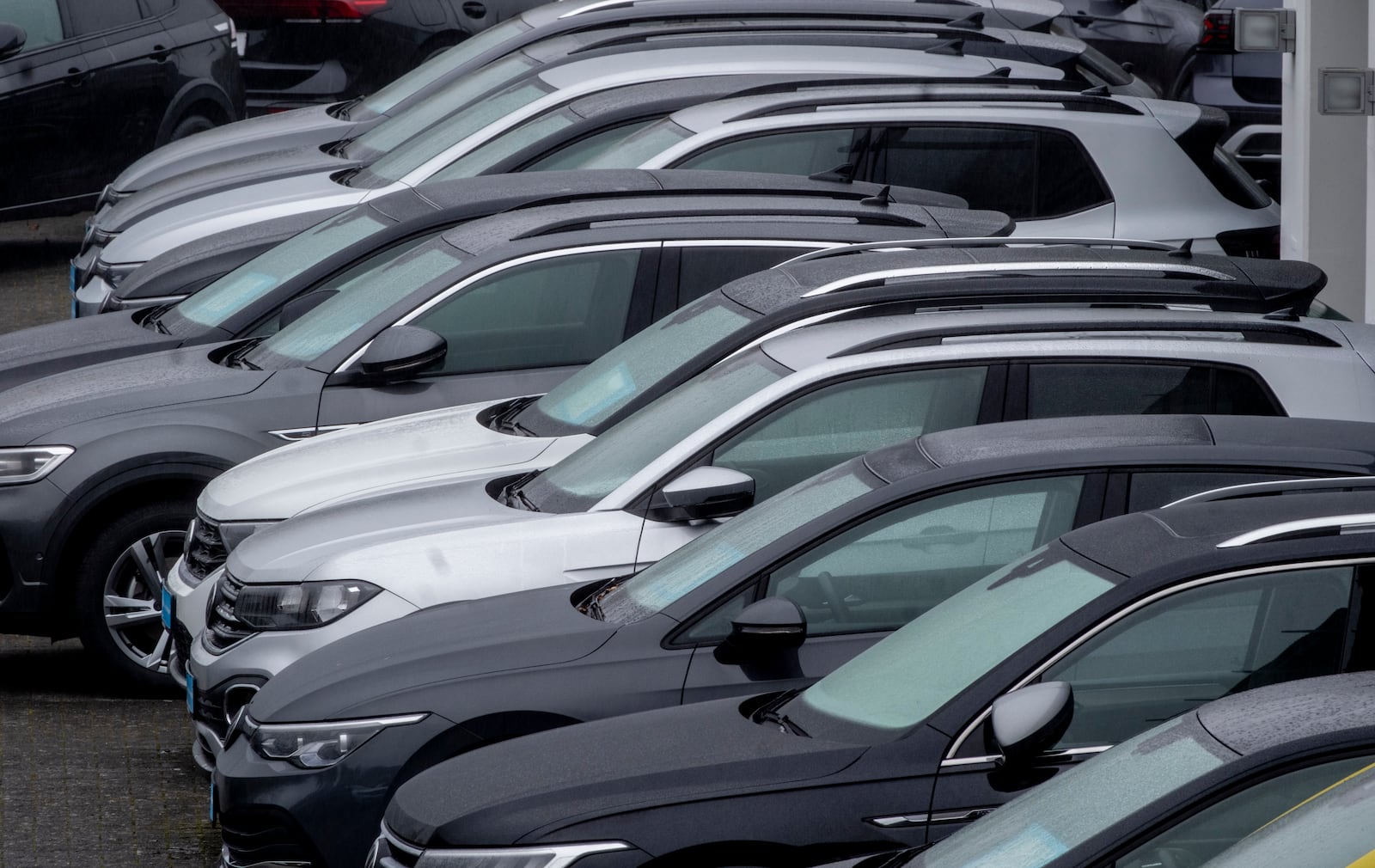 Volkswagen cars of a car dealer are parked in Neu-Anspach near Frankfurt, Germany, Wednesday, Oct. 30, 2024. (AP Photo/Michael Probst)