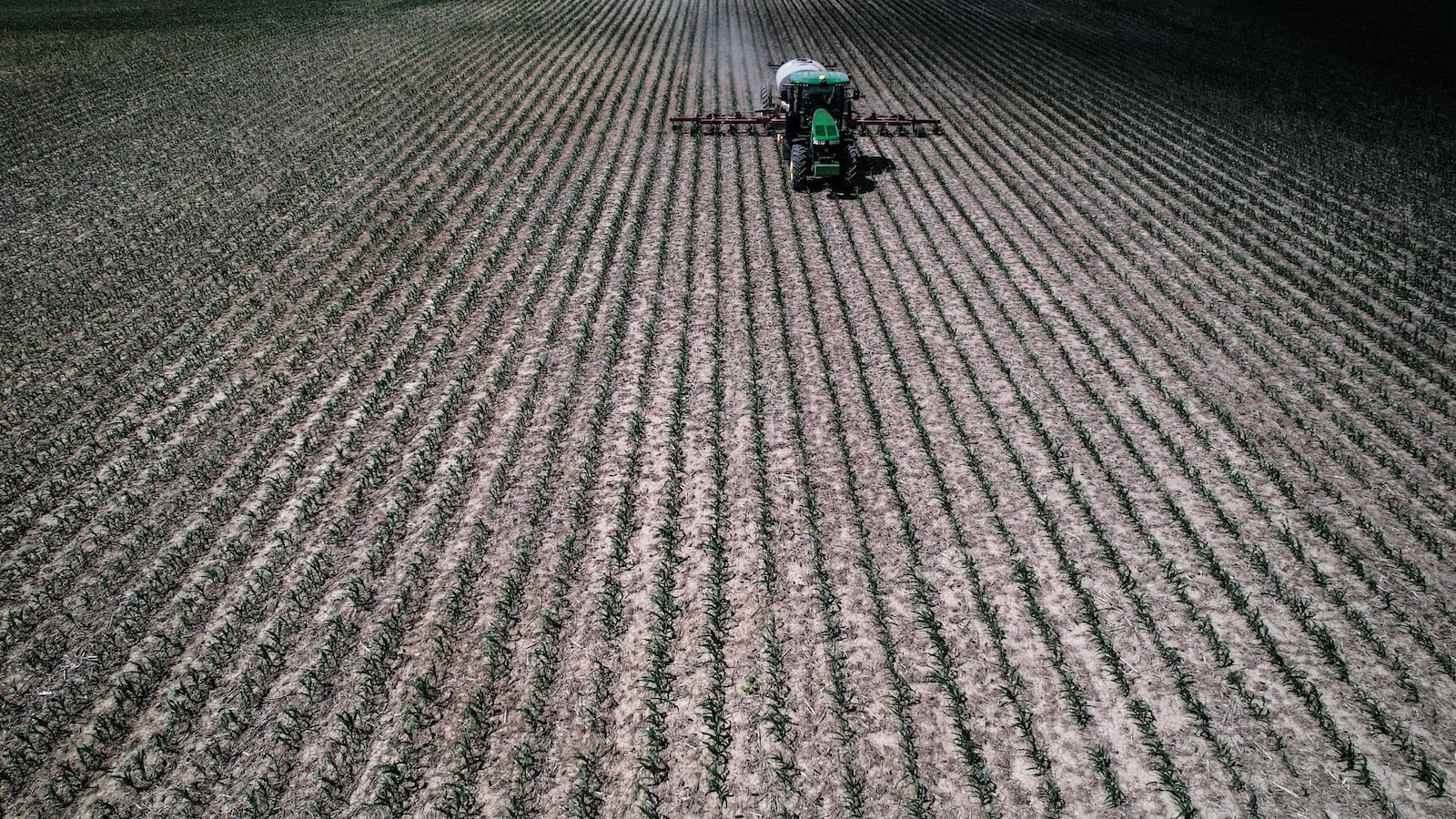 Tom Sears, from Farmersville, applies nitrogen on his corn crop near Hemple Road Wednesday May 31, 2023. Sears has been farming in western Montgomery County for 47 years. JIM NOELKER/STAFF