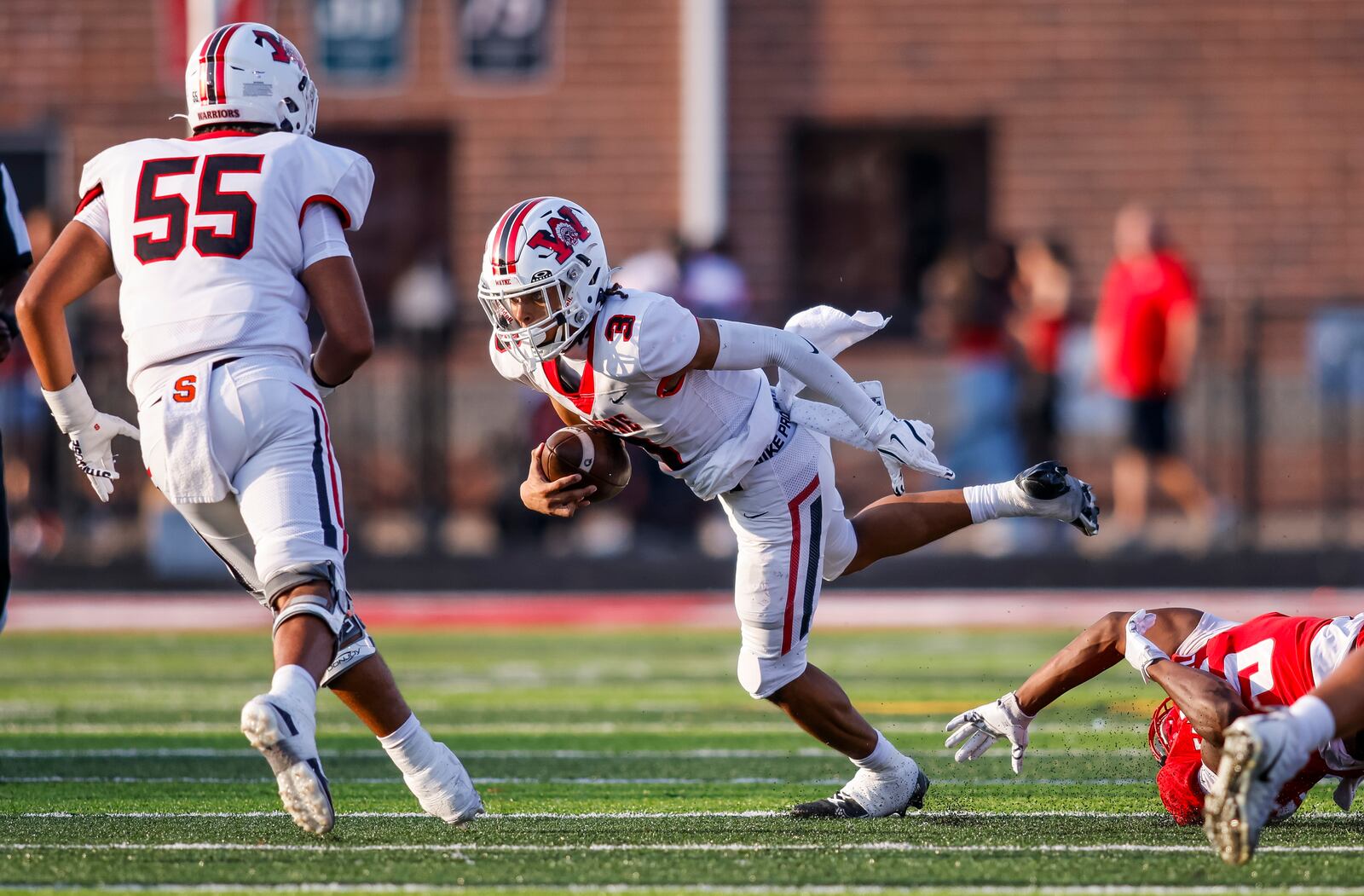 Wayne's Teaunn Hunter carries the ball during their game against Fairfield. Wayne defeated Fairfield 31-13 on opening night of high school football Friday, Aug. 23, 2024 at Fairfield Alumni Stadium. NICK GRAHAM/STAFF