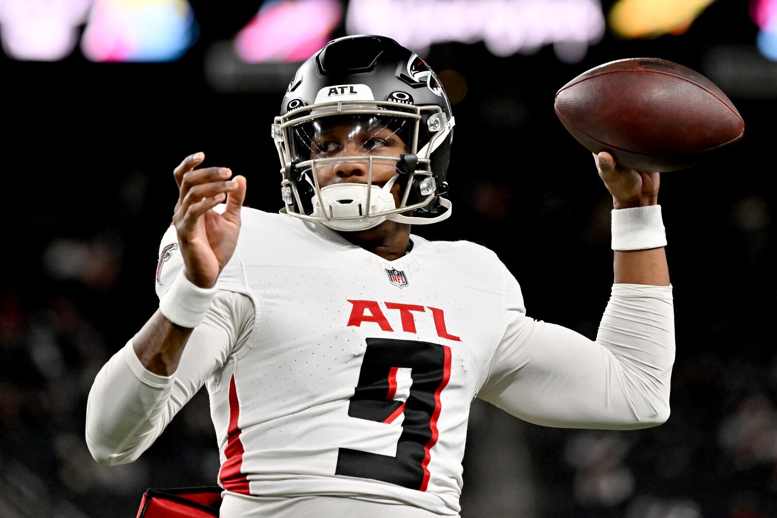 FILE - Atlanta Falcons quarterback Michael Penix Jr. warms up prior to an NFL football game against the Las Vegas Raiders, Monday, Dec. 16, 2024, in Las Vegas. (AP Photo/David Becker, File)