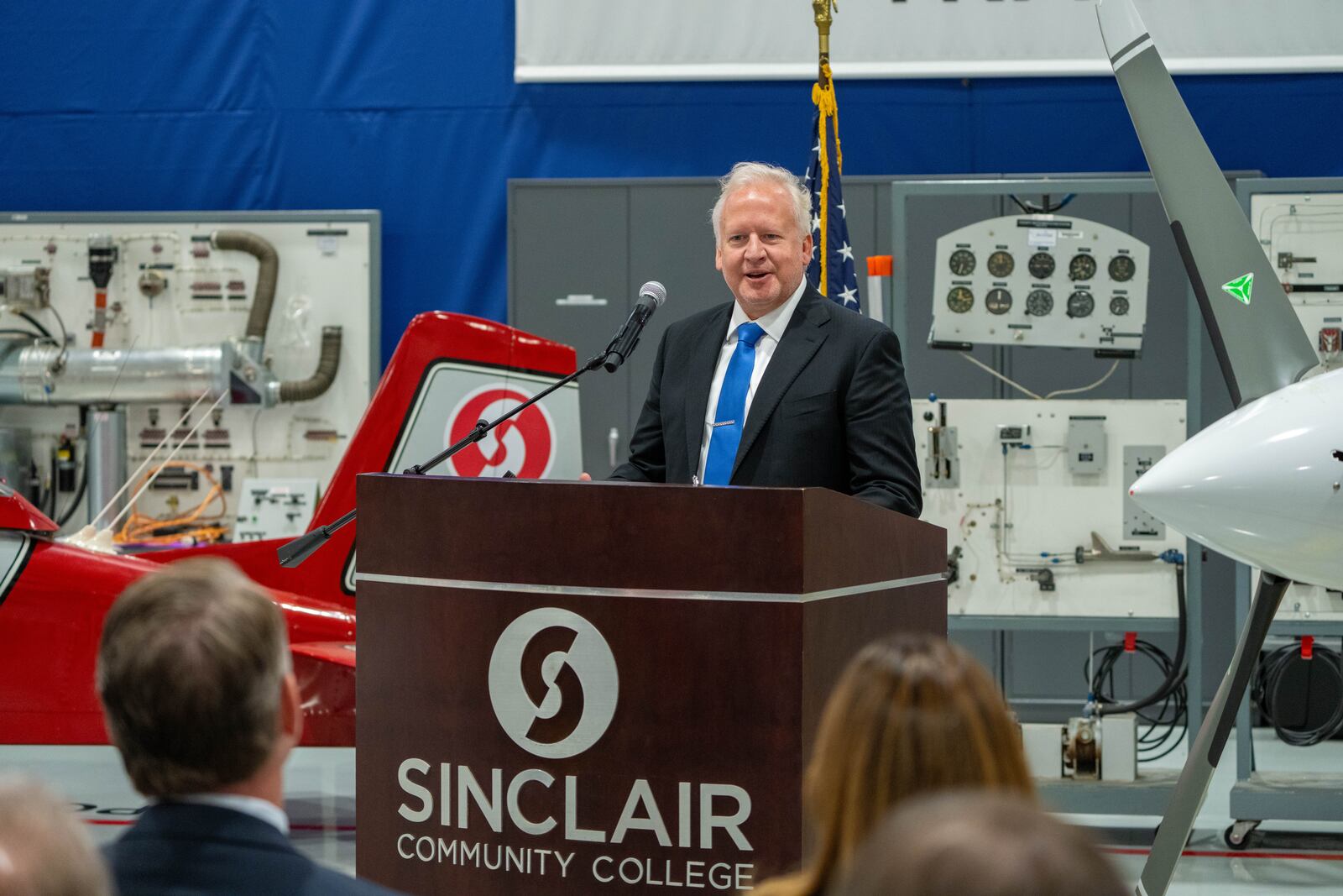 Mark Williams, senior vice president of strategy at Sierra Nevada Corp., speaks during the opening of the Sinclair Community College Aviation Maintenance Training Facility on Nov. 6 at the Dayton International Airport.