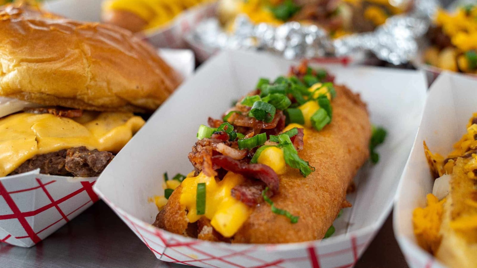 Tasty Bacon’s, a new food truck offering smash burgers, hand dipped corn dogs, loaded potatoes and breakfast items, is now serving the Fairborn area (CONTRIBUTED PHOTO).