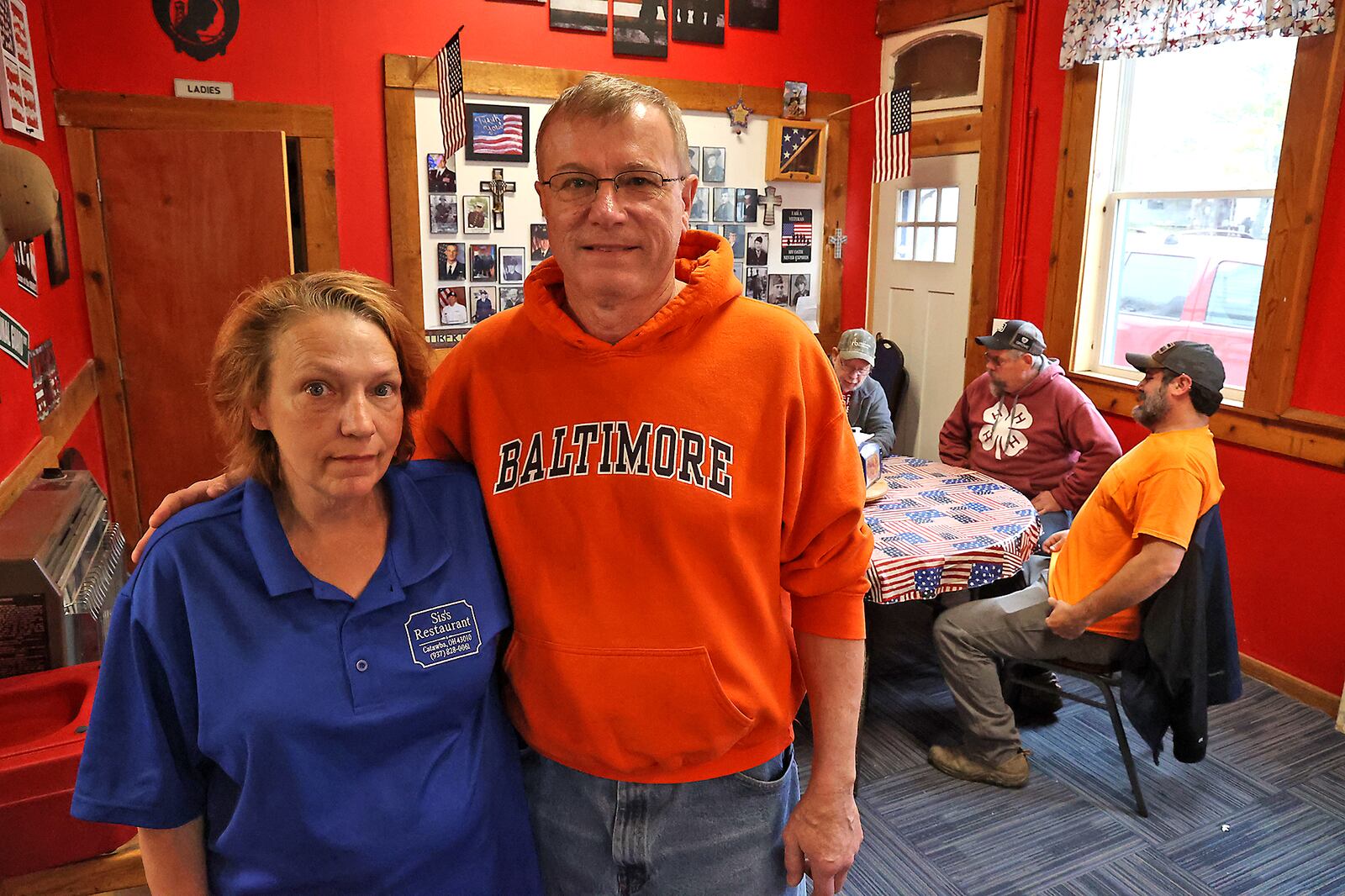 Matt Warner and his wife, Mandie, the owners of Sis's Restaurant in Catawba, in their restaurant. Matt and his wife, Mandie, have decided to close the restaurant due to rising food costs. BILL LACKEY/STAFF