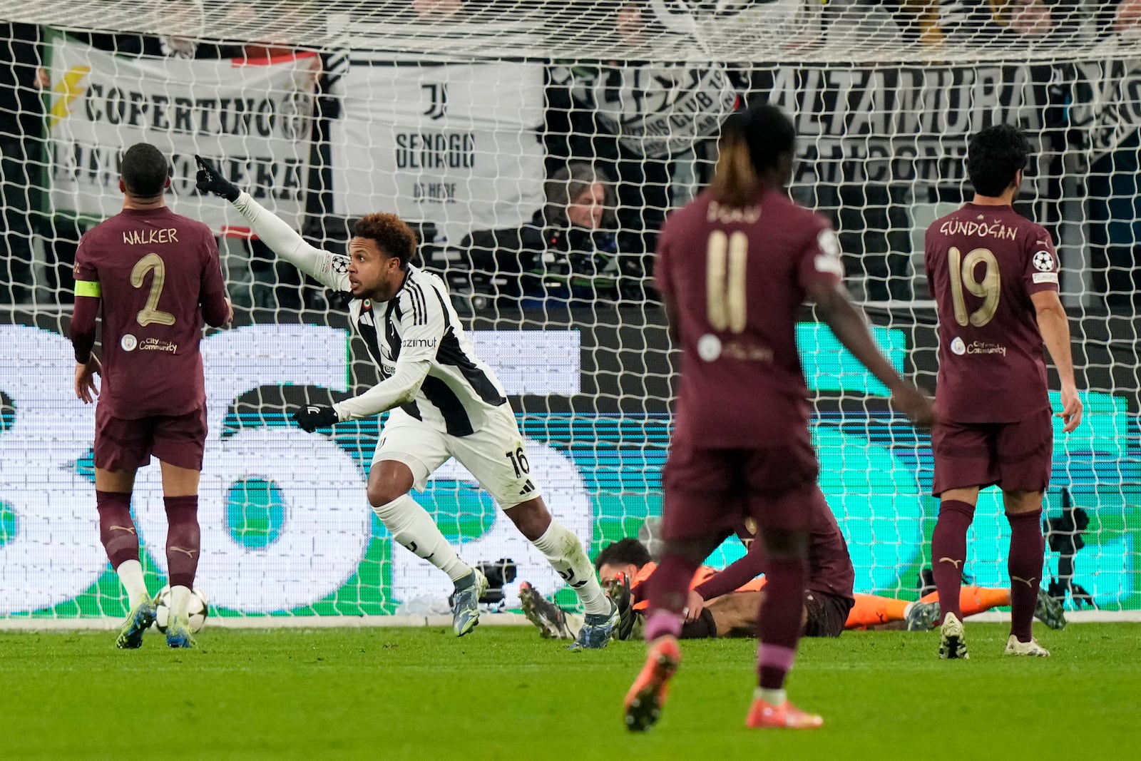 Juventus' Weston McKennie celebrates his side's second goal during the Champions League, opening phase soccer match between Juventus and Manchester City at the Allianz stadium in Turin, Italy, Tuesday, Wednesday, Dec.11, 2024. (AP Photo/Luca Bruno)