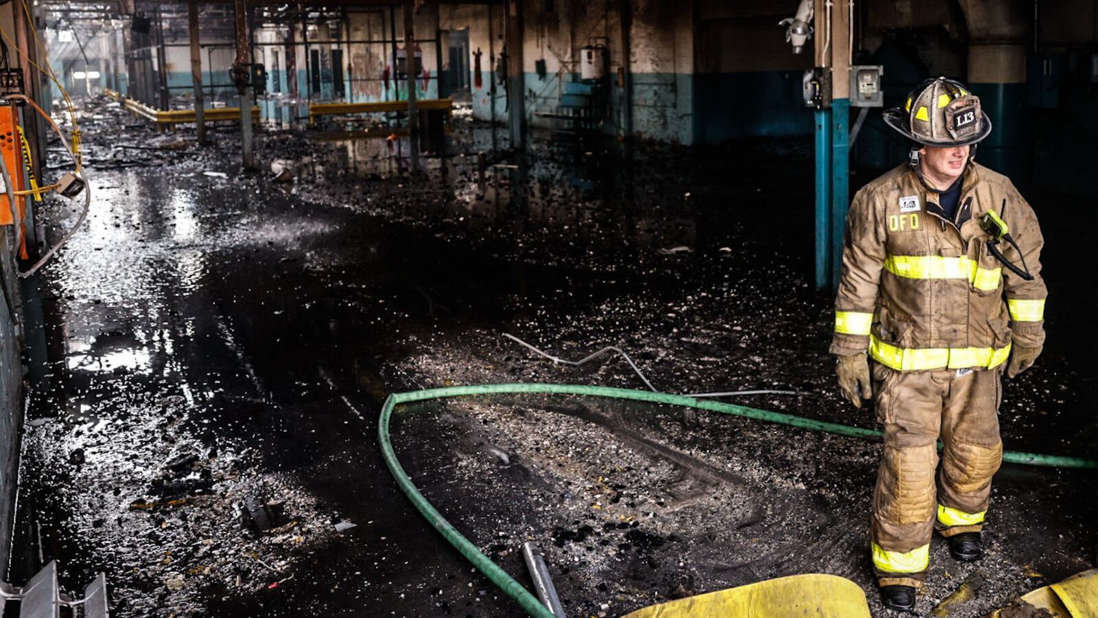 The Dayton Fire Department was putting out hot spots Monday morning March 27, 2023 after a Sunday morning fire at the Wright Company Factory site on West Third Street. JIM NOELKER/STAFF