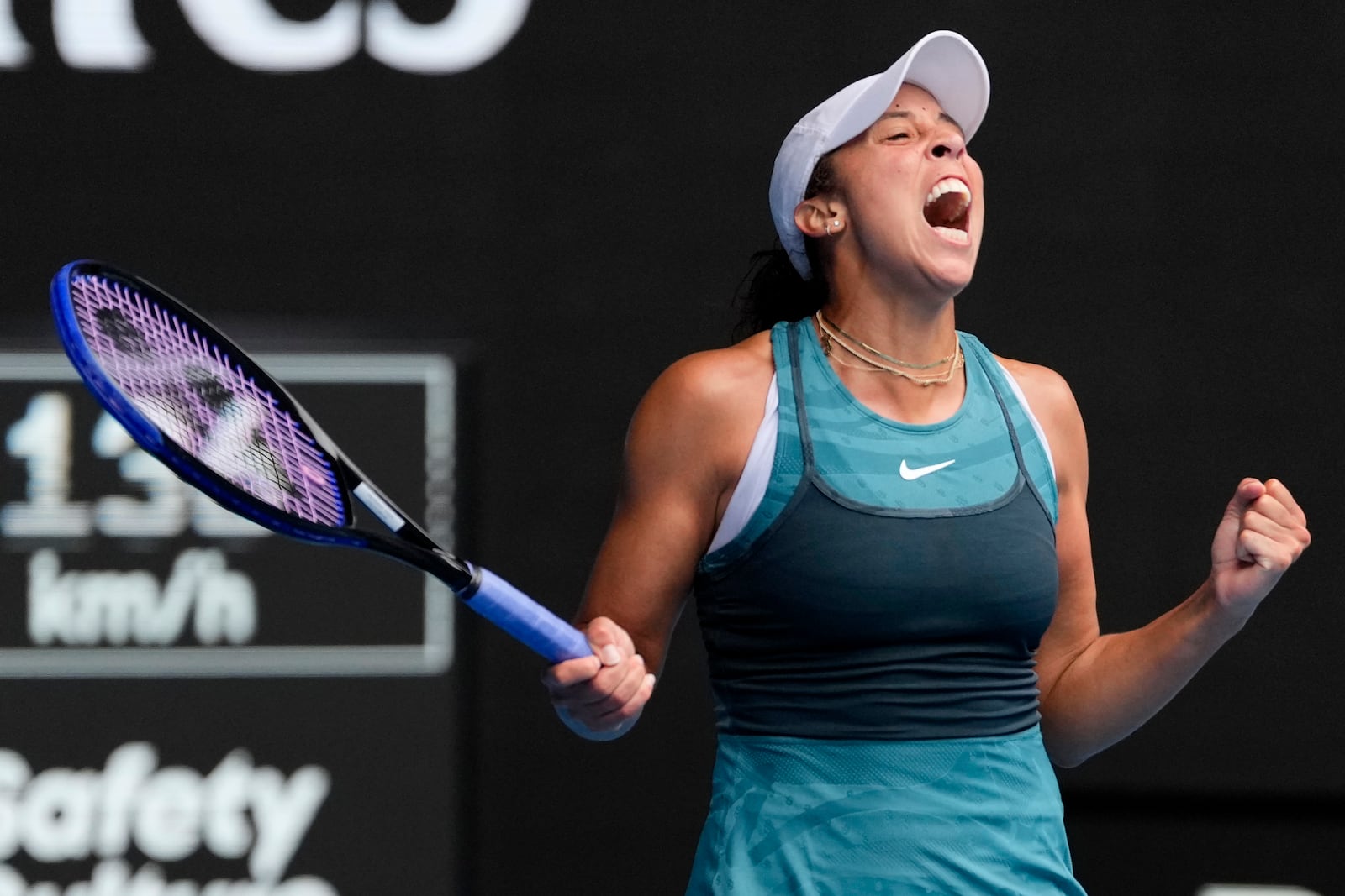 Madison Keys of the U.S. celebrates after defeating Elina Svitolina of Ukraine in their quarterfinal match at the Australian Open tennis championship in Melbourne, Australia, Wednesday, Jan. 22, 2025. (AP Photo/Vincent Thian)