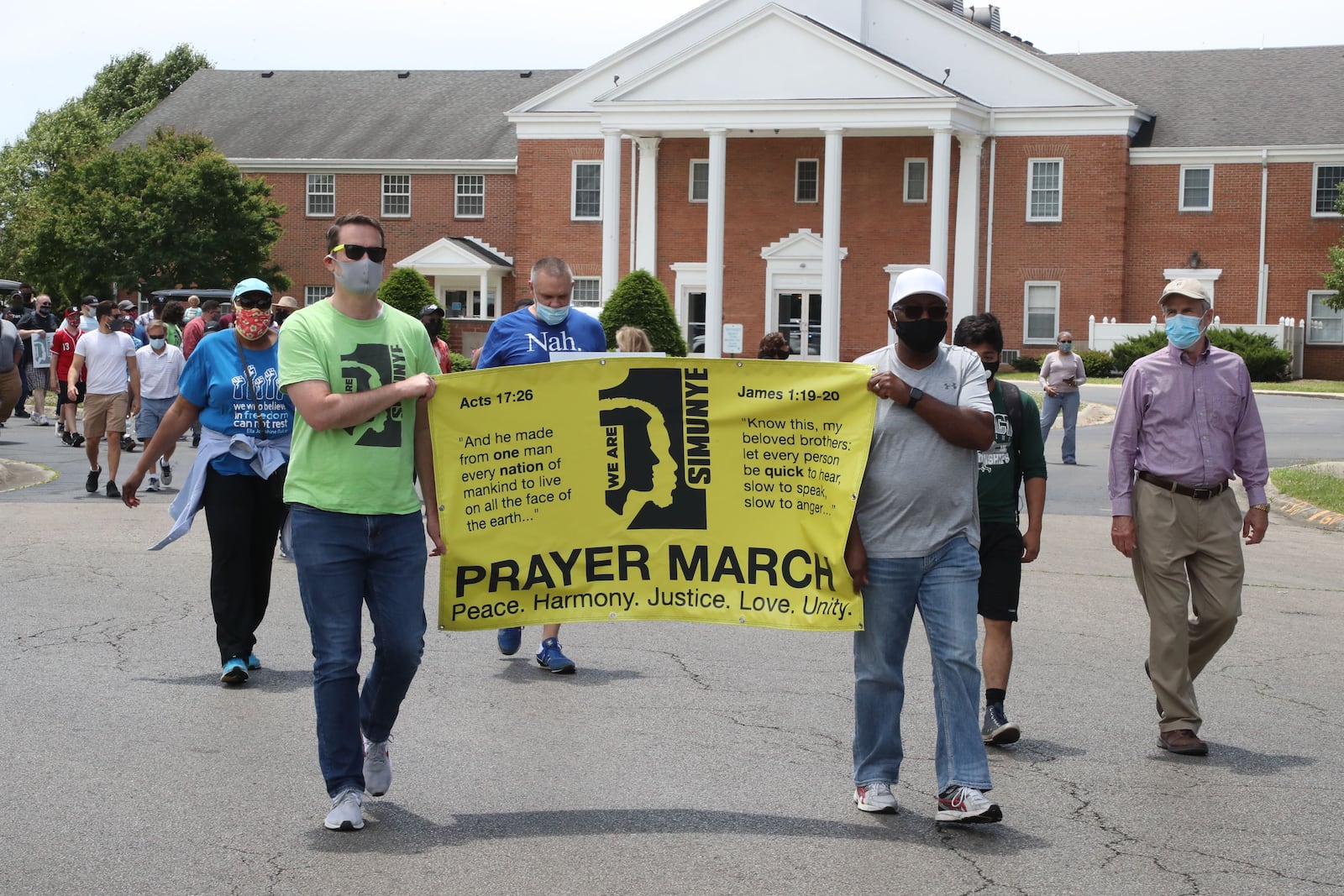 A group of Springfield clergy are leading a six-mile march through the city this afternoon to call attention to discrimination, police brutality, racial profiling and unequal treatment under the law for minorities. BILL LACKEY/STAFF