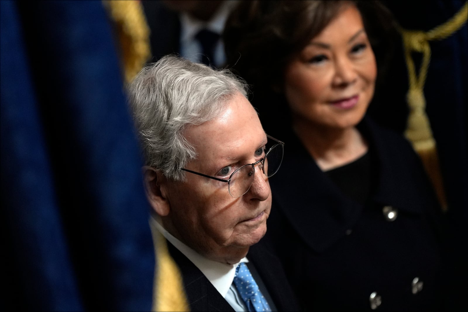 Sen. Mitch McConnell, R-Ky., and Elaine Chao arrive before the 60th Presidential Inauguration in the Rotunda of the U.S. Capitol in Washington, Monday, Jan. 20, 2025. (AP Photo/Julia Demaree Nikhinson, Pool)