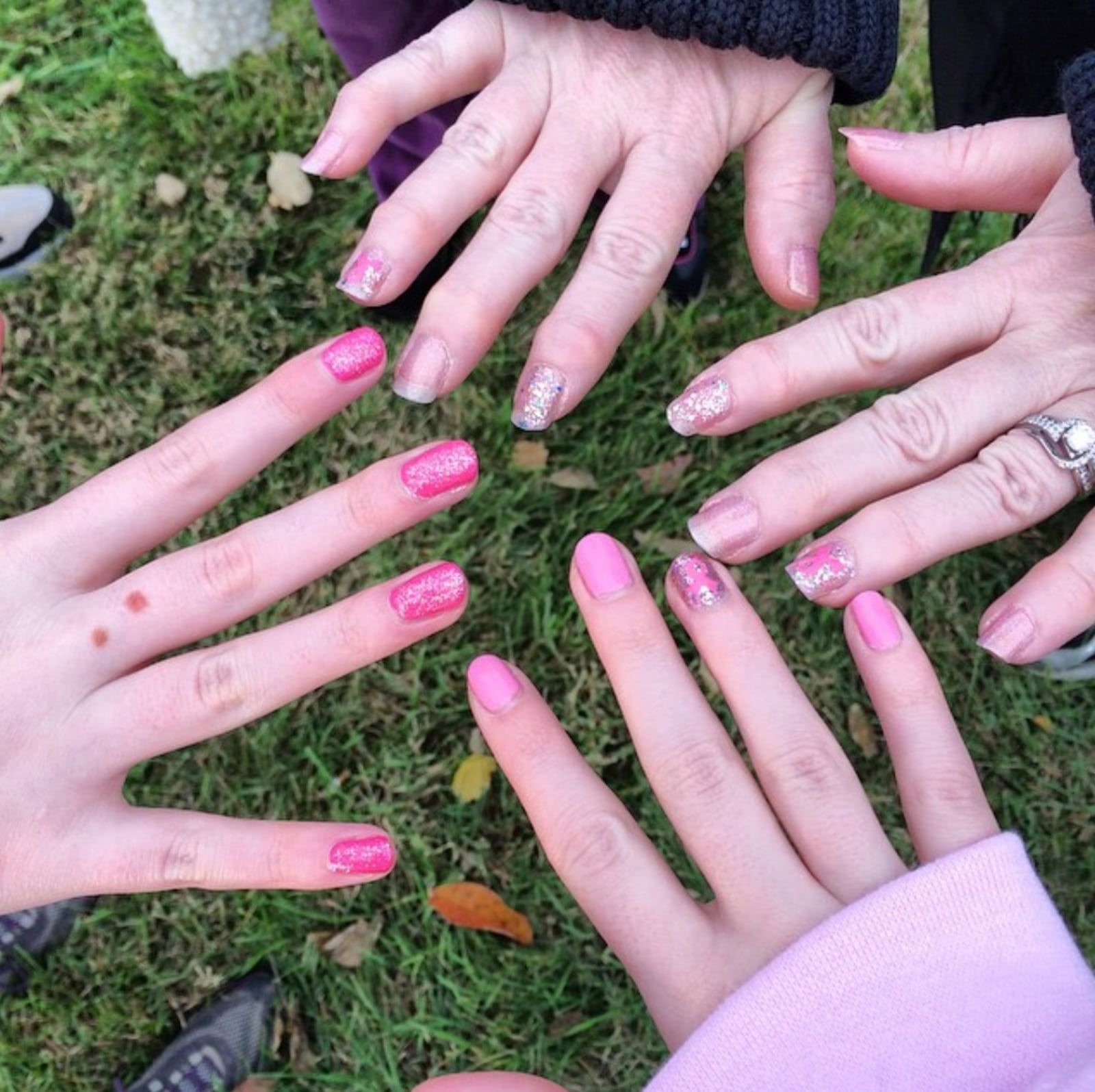 Before a past Making Strides Against Breast Cancer Walk in Dayton, Lauren Rinehart, sister Beth Weeks, mother Shari Young and grandmother Roberta Shank got pink manicures to match their pink walking gear. CONTRIBUTED