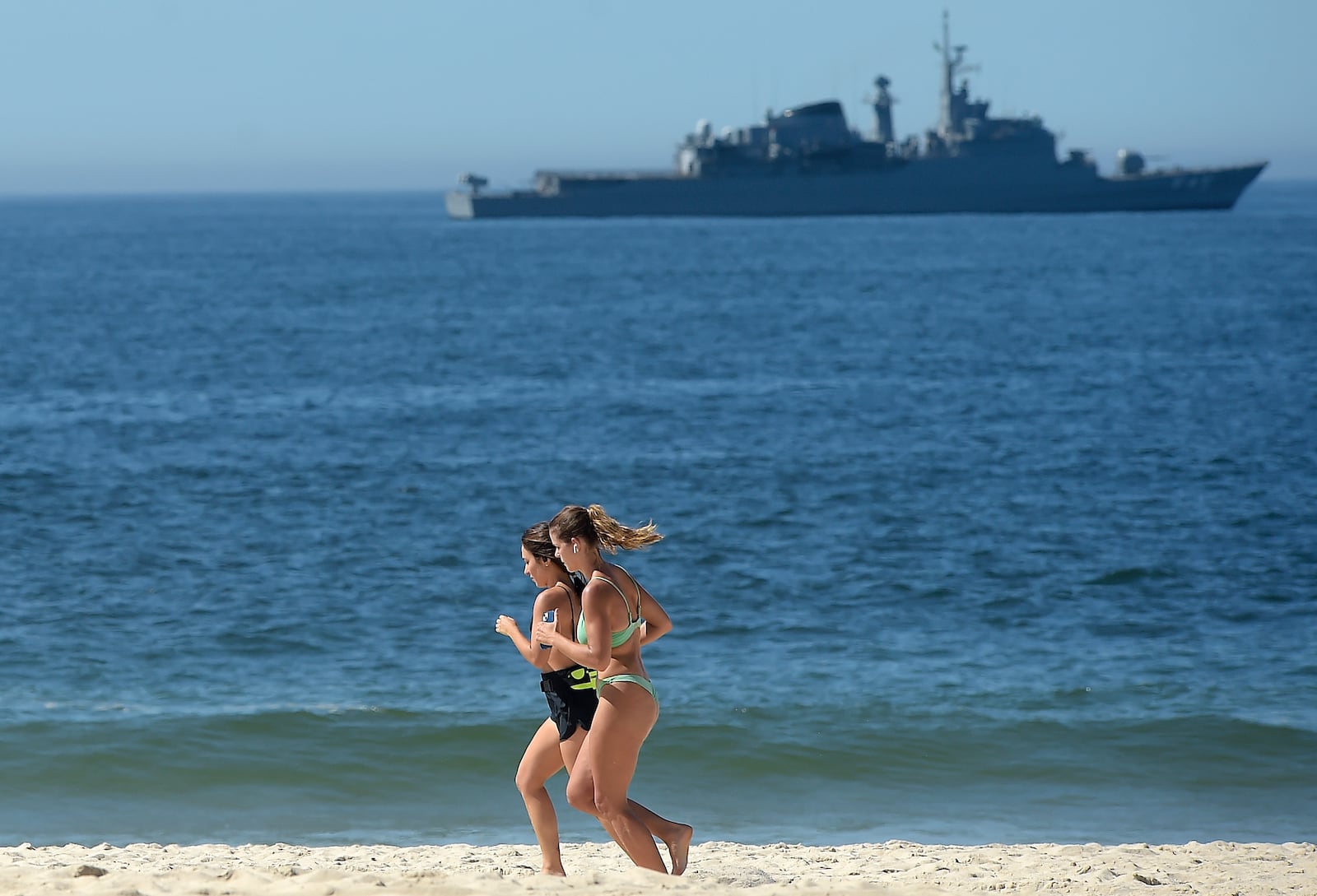 A Brazilian Navy ship patrols off Copacabana beach during the G20 Summit in Rio de Janeiro, Monday, Nov. 18, 2024. (AP Photo/Dhavid Normando)