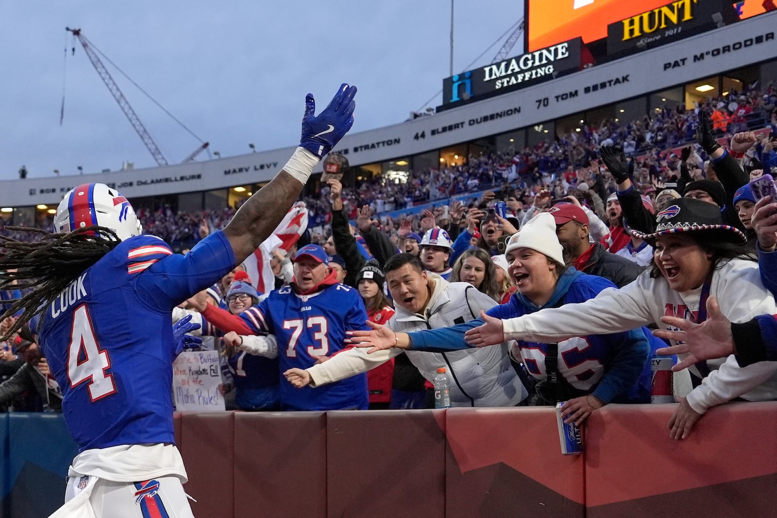 Buffalo Bills running back James Cook (4) celebrates after scoring during the first half of an NFL football game against the Kansas City Chiefs Sunday, Nov. 17, 2024, in Orchard Park, N.Y. (AP Photo/Julia Demaree Nikhinson)