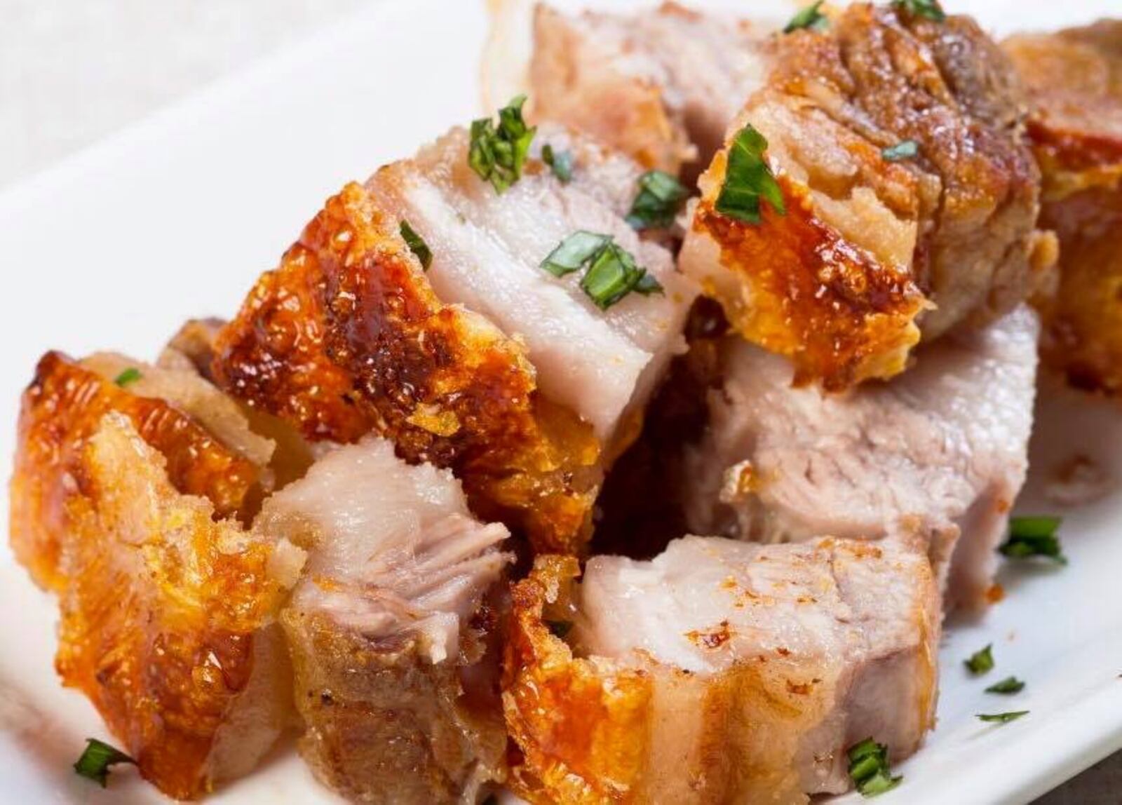 Amanda and Dr. Martin Vincente are launching their food truck trailer, HaolePino Hawaiian-Filipino Island Cuisine, at Airway Shopping Center Nov. 9, 2018.  The Riverside couple has five children. Pictured: Lechon Kawali, a popular Filipino dish made with pork belly simmered until tender and then deep-fried until golden and crisp.